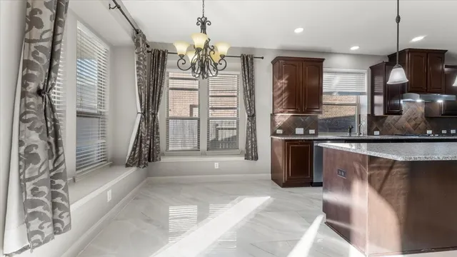 a view of livingroom with fireplace and furniture