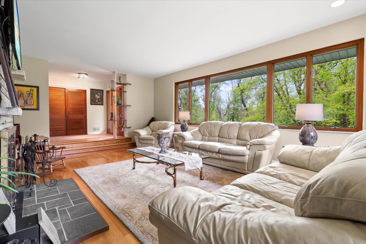 22446 North Old Barrington Road Barrington, IL 60618 - Photo 13 of 49 a living room with furniture and a large window