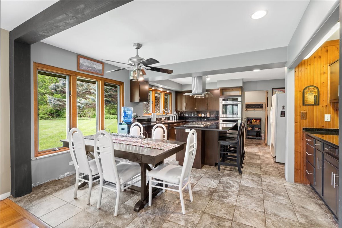 22446 North Old Barrington Road Barrington, IL 60618 - Photo 18 of 49 a view of a dining room with furniture window and outside view