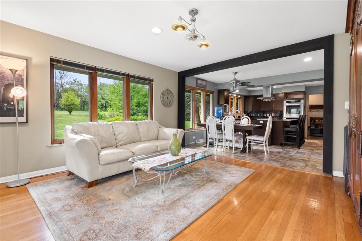 22446 North Old Barrington Road Barrington, IL 60618 - Photo 19 of 49 a living room with furniture and wooden floor