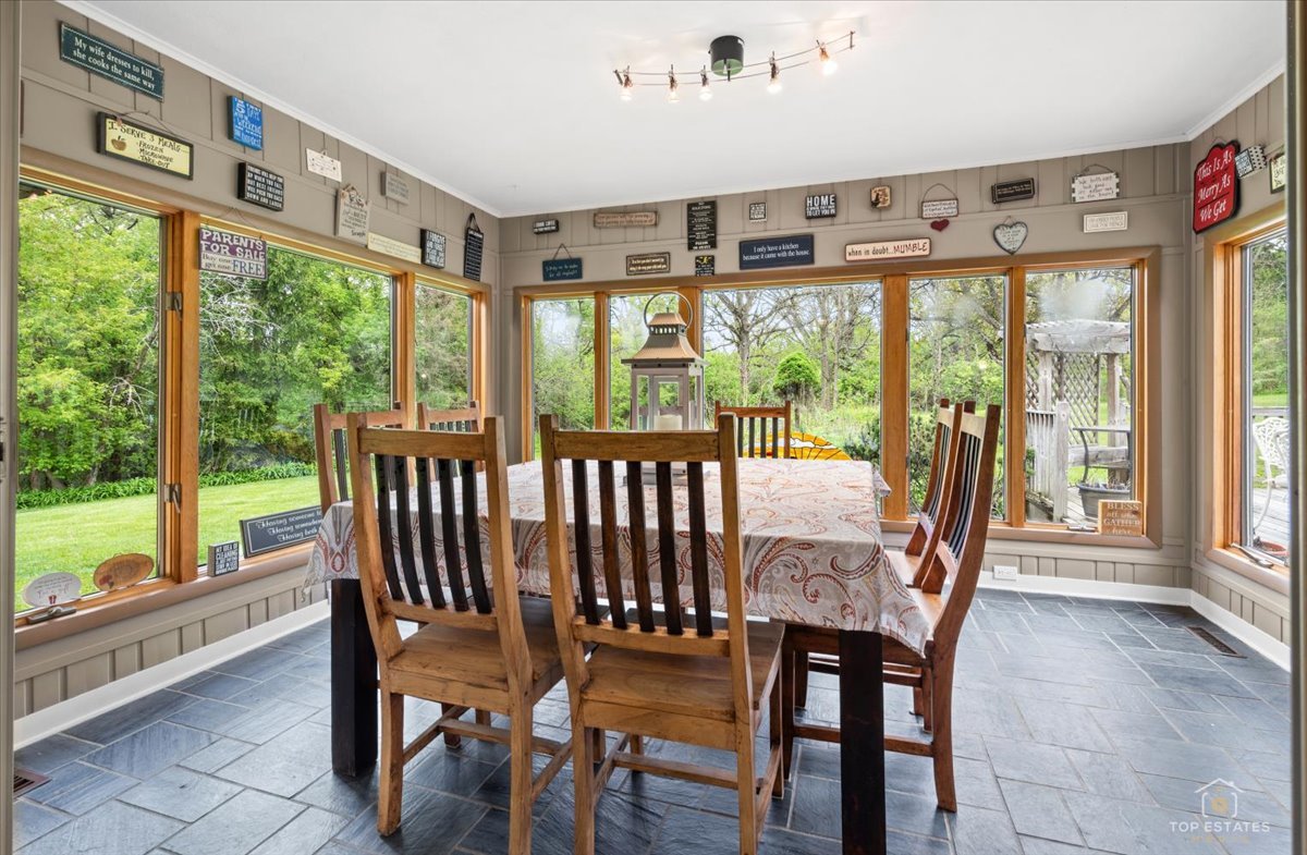 22446 North Old Barrington Road Barrington, IL 60618 - Photo 21 of 49 a view of a large dining room with furniture window and outside view