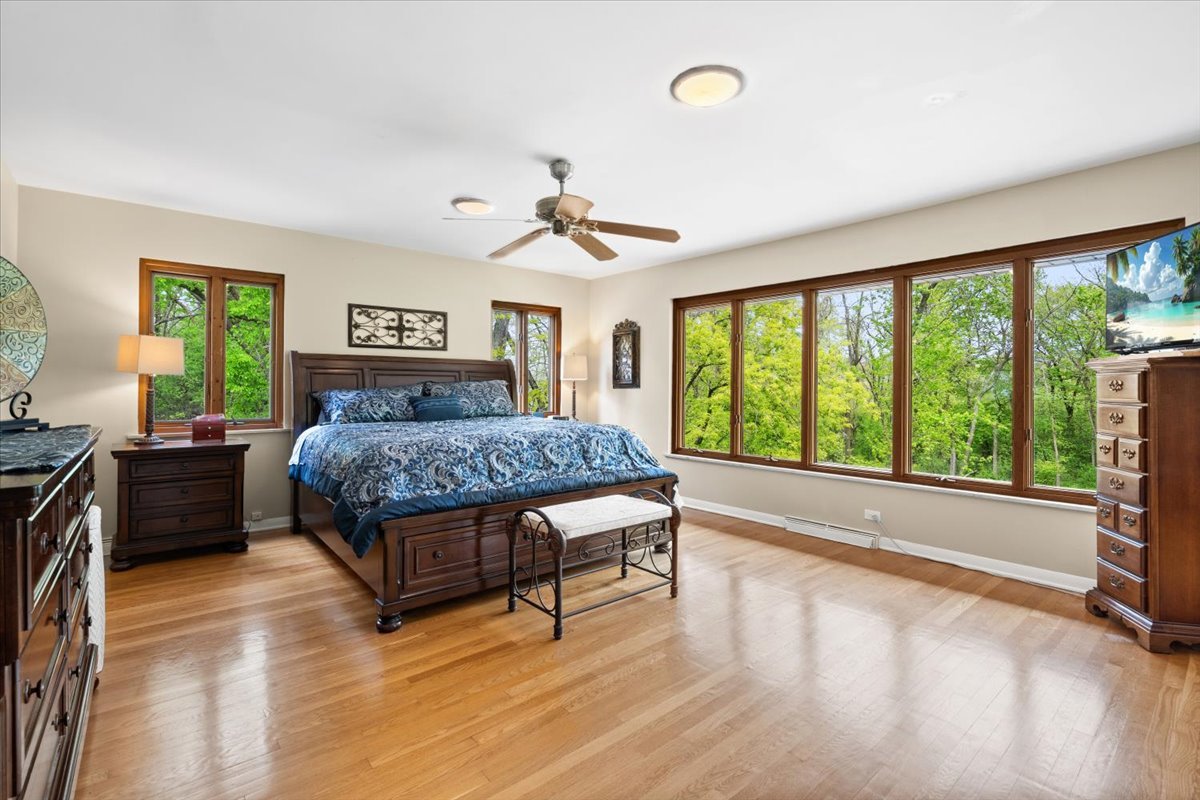 22446 North Old Barrington Road Barrington, IL 60618 - Photo 23 of 49 a bed room with a bed and a large window