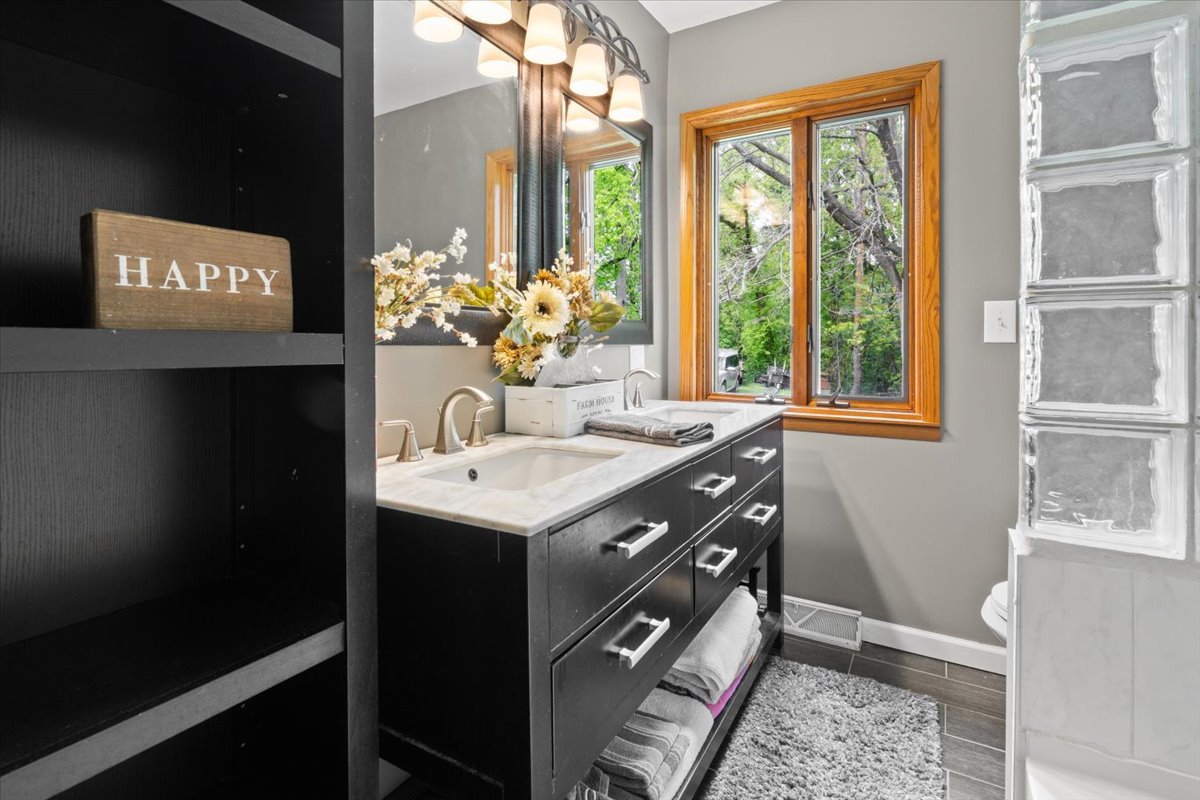 22446 North Old Barrington Road Barrington, IL 60618 - Photo 29 of 49 a bathroom with a sink and a mirror