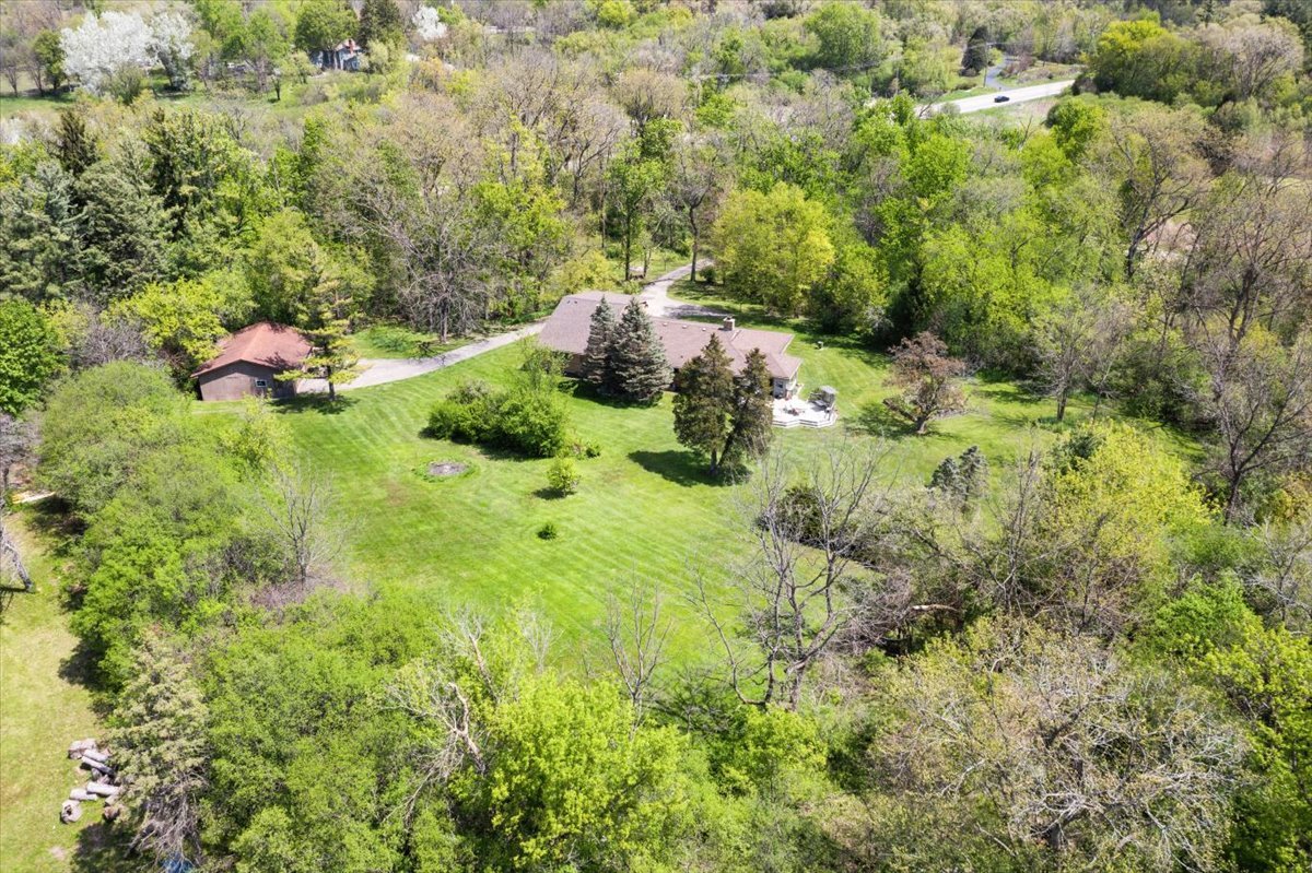 22446 North Old Barrington Road Barrington, IL 60618 - Photo 46 of 49 a backyard of a house with a yard and fountain