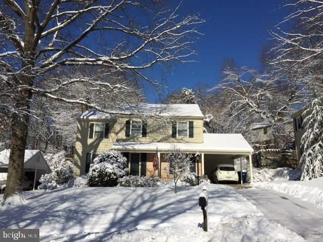 a view of a building with a backyard
