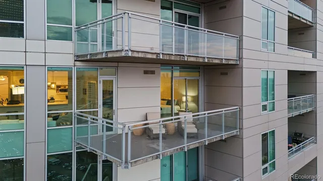 a view of balcony with furniture
