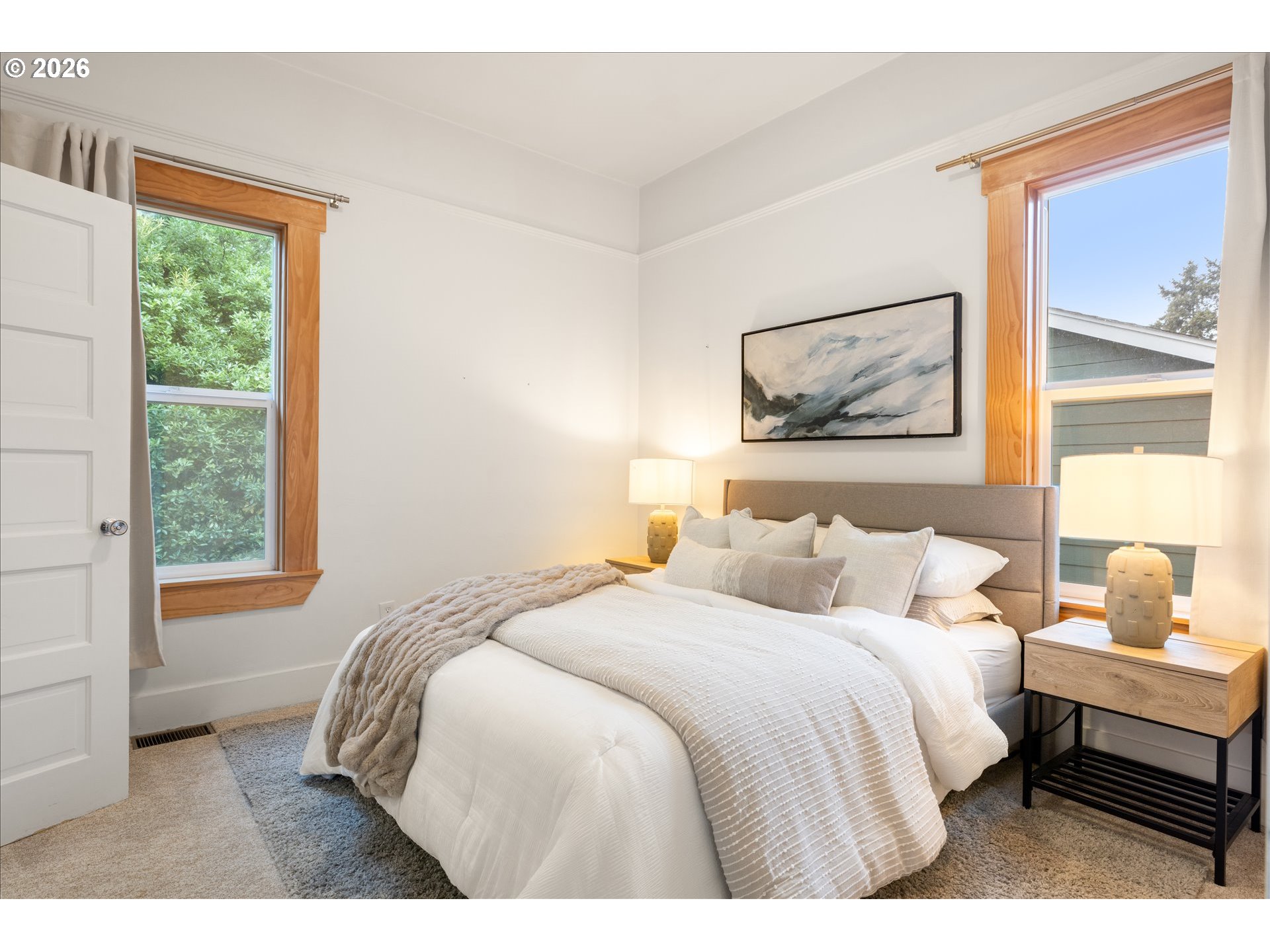 2055 North Alberta Street Portland, OR 97217 - Photo 12 of 38 a bedroom with a bed and a window