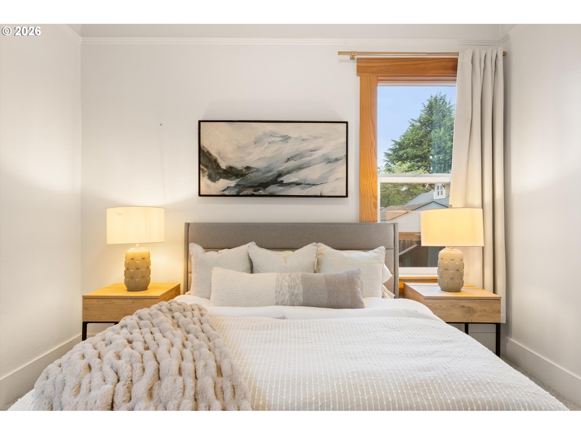 2055 North Alberta Street Portland, OR 97217 - Photo 13 of 38 a bedroom with a bed and a painting on the wall