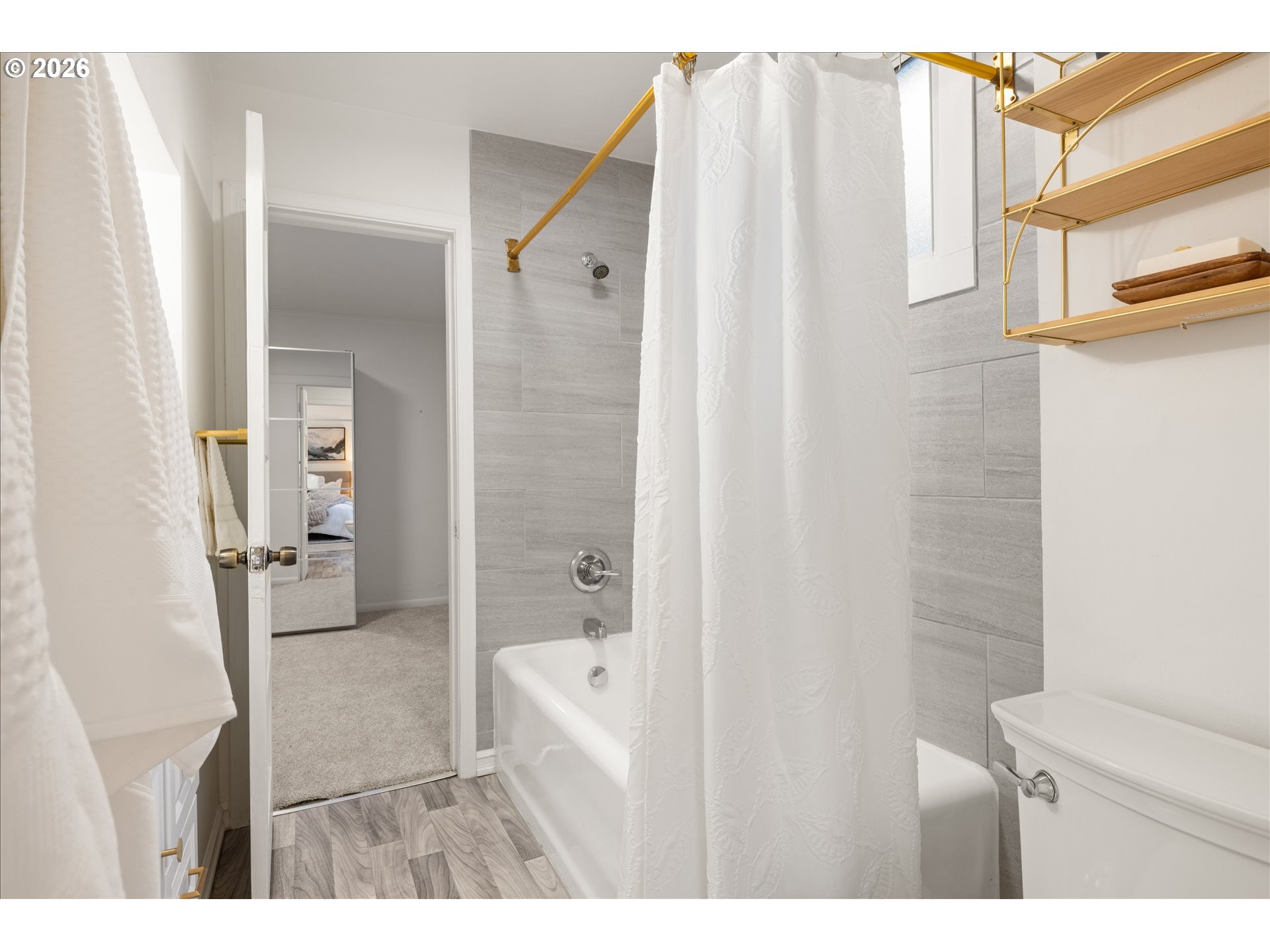 2055 North Alberta Street Portland, OR 97217 - Photo 14 of 38 a bathroom with a shower and a sink