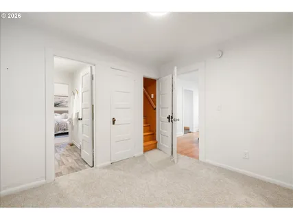 a view of hallway with stairs