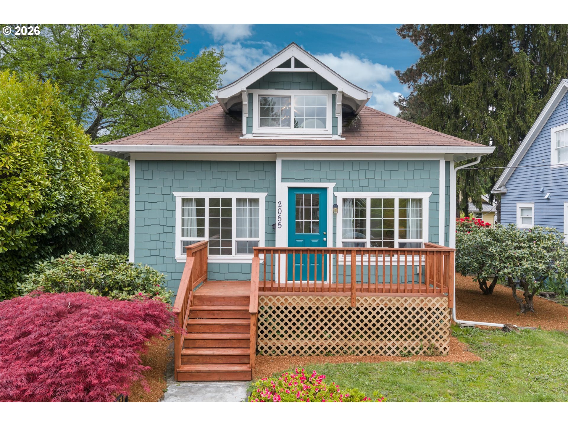 2055 North Alberta Street Portland, OR 97217 - Photo 2 of 38 a front view of a house with a garden