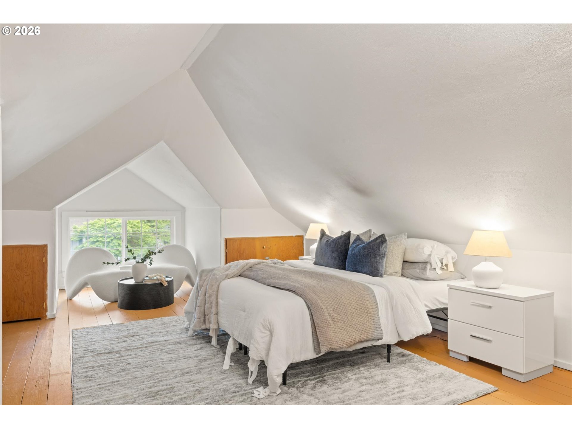 2055 North Alberta Street Portland, OR 97217 - Photo 23 of 38 a bedroom with a bed and large windows