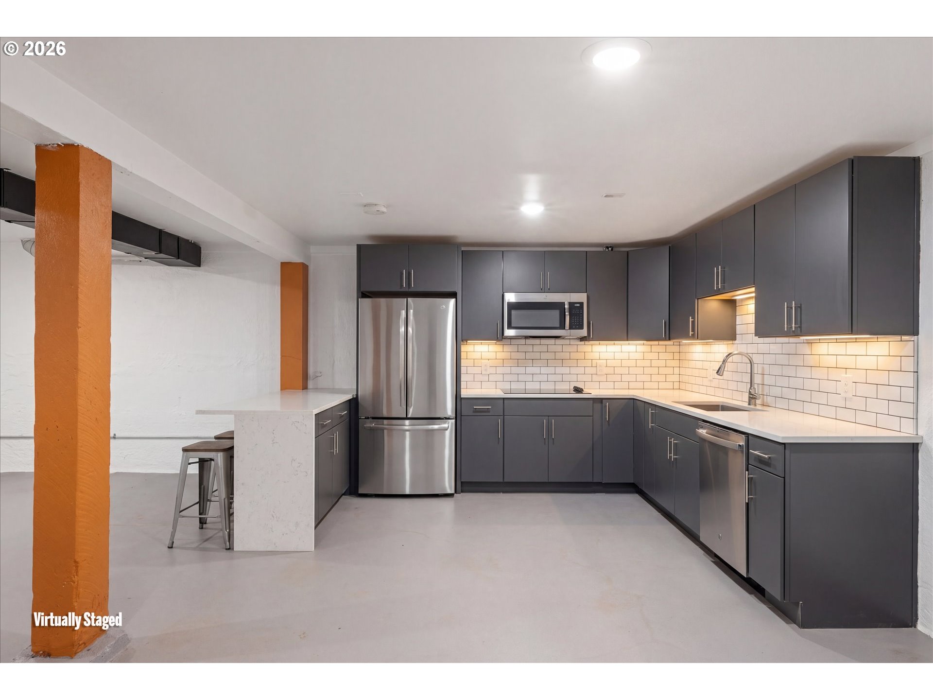 2055 North Alberta Street Portland, OR 97217 - Photo 25 of 38 a large kitchen with kitchen island a sink stainless steel appliances and cabinets