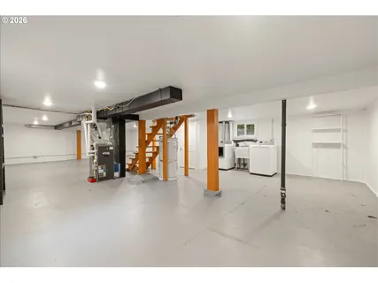 a utility room with washer and dryer