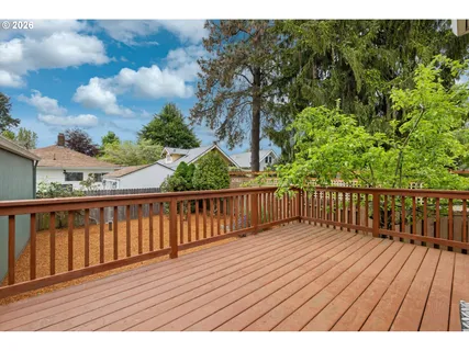 a view of a porch with wooden floor