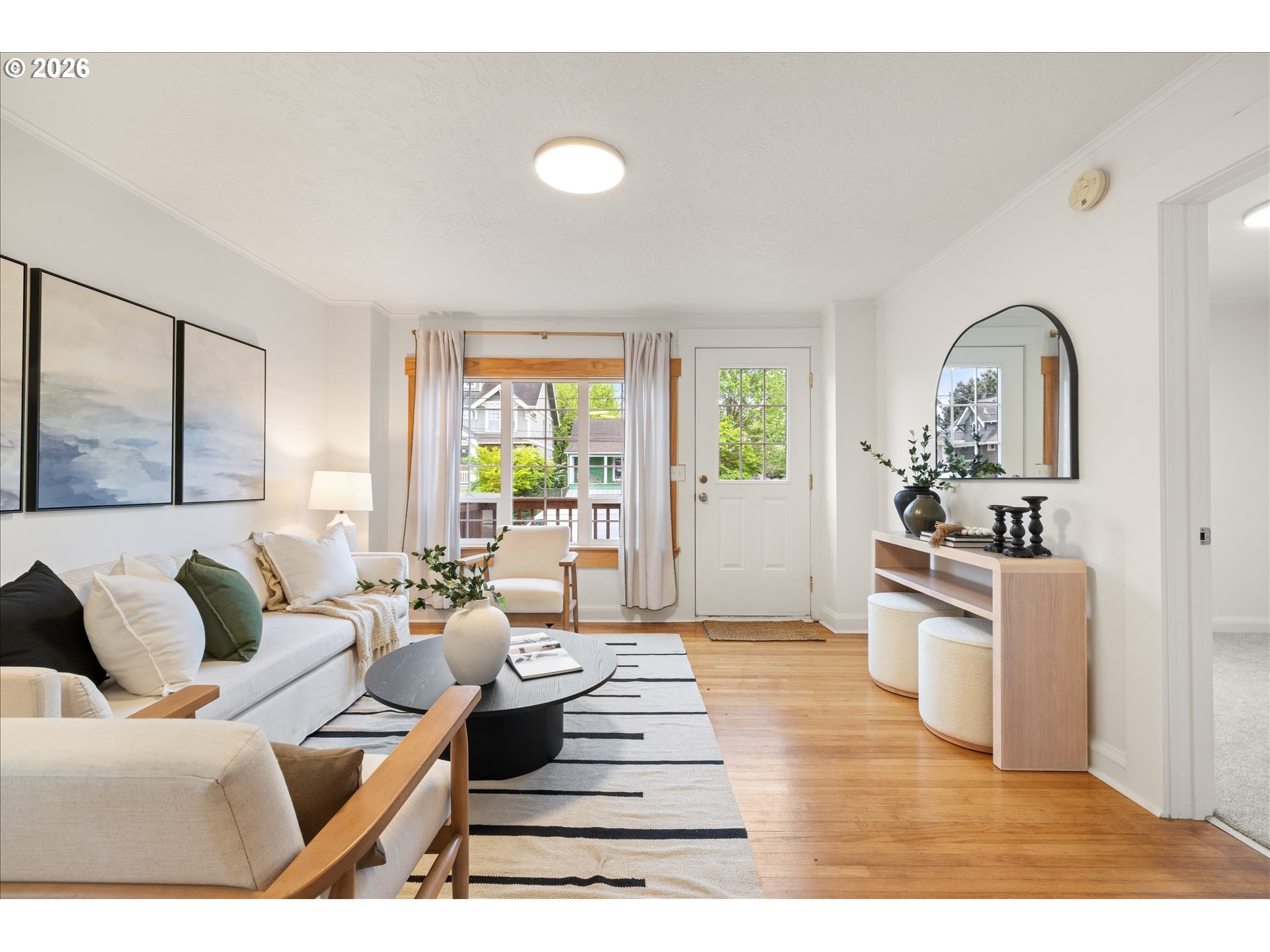 2055 North Alberta Street Portland, OR 97217 - Photo 5 of 38 a living room with furniture and a large window