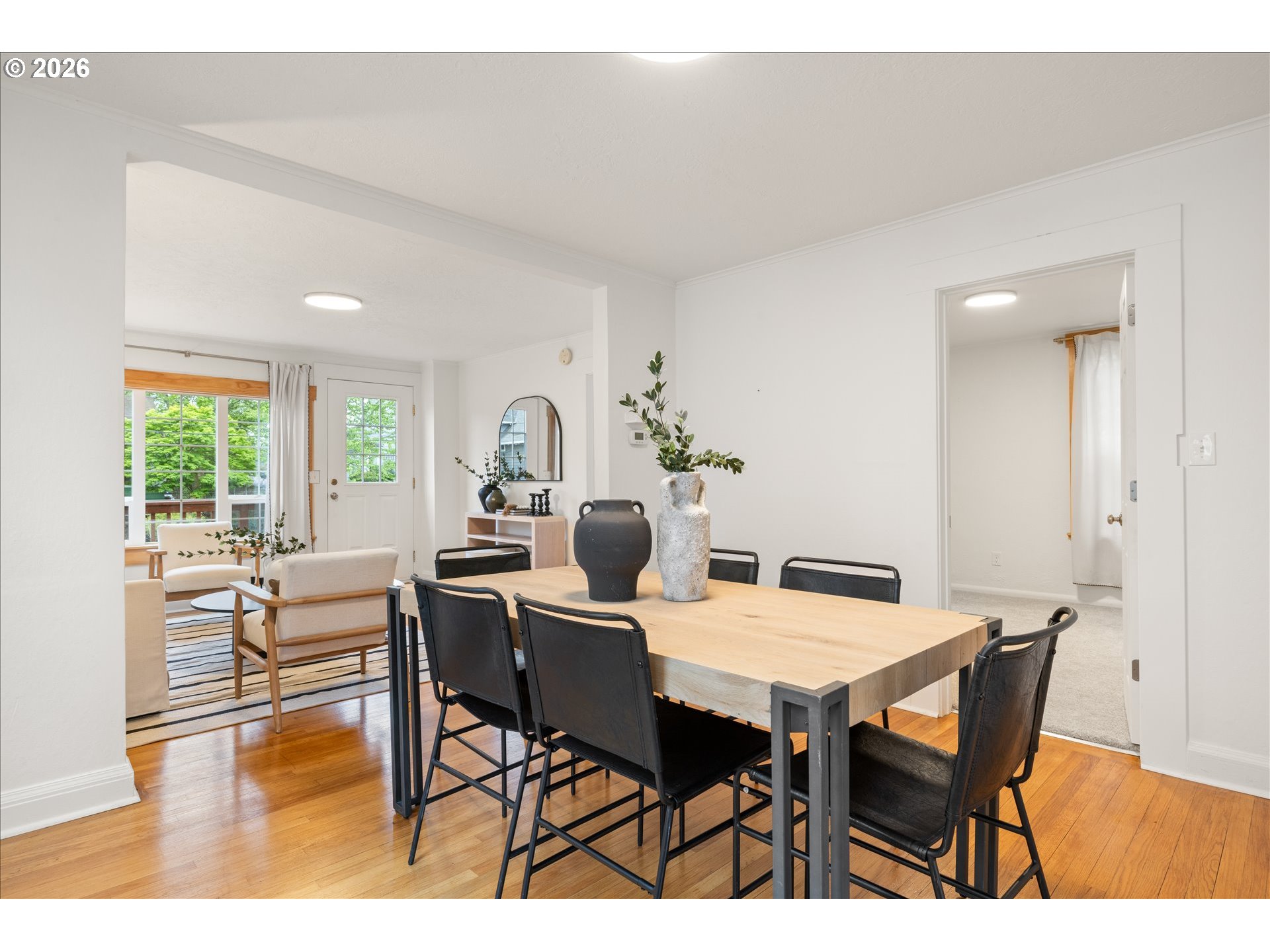 2055 North Alberta Street Portland, OR 97217 - Photo 7 of 38 a view of a dining room with furniture and wooden floor