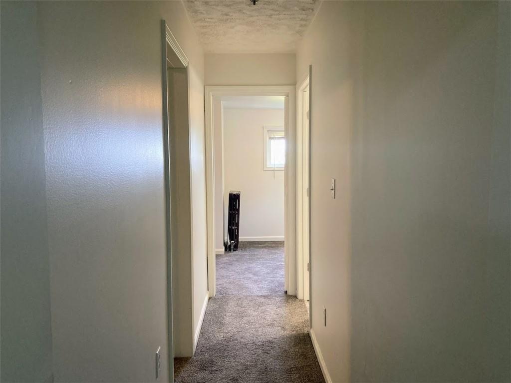 4974 Williamsport Road Elizabeth, PA 15037 - Photo 11 of 34 a view of a hallway with wooden floor