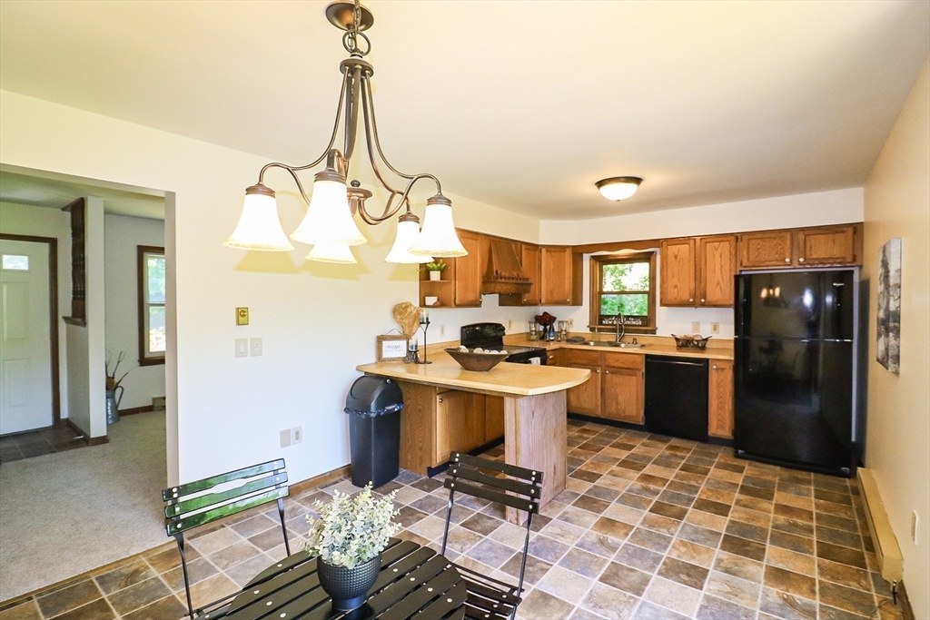 58 Old Belchertown Road Ware, MA 01082 - Photo 8 of 42 a kitchen with a sink cabinets and appliances