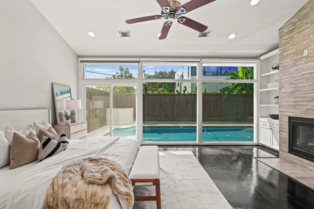 a bed room with a bed and a television