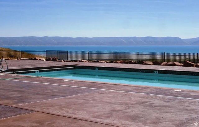 2 Summit, Unit 1 Fish Haven, ID 83287 - Photo 18 of 18 Pool & Hot TubEnjoy the breathtaking view of Bear Lake and the surrounding mountains as you and your family relax in the hot tub or play in our child-friendly pool. In the hot summer months, kids can enjoy the new splash pad installed at The Reserve Lod