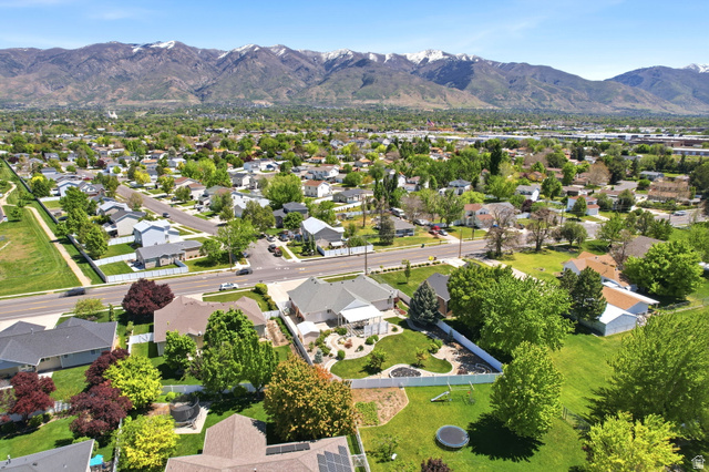 776 Flint Street Layton, UT 84041 - Photo 32 of 41 Expansive residential neighborhood with mature trees and mountain backdrop