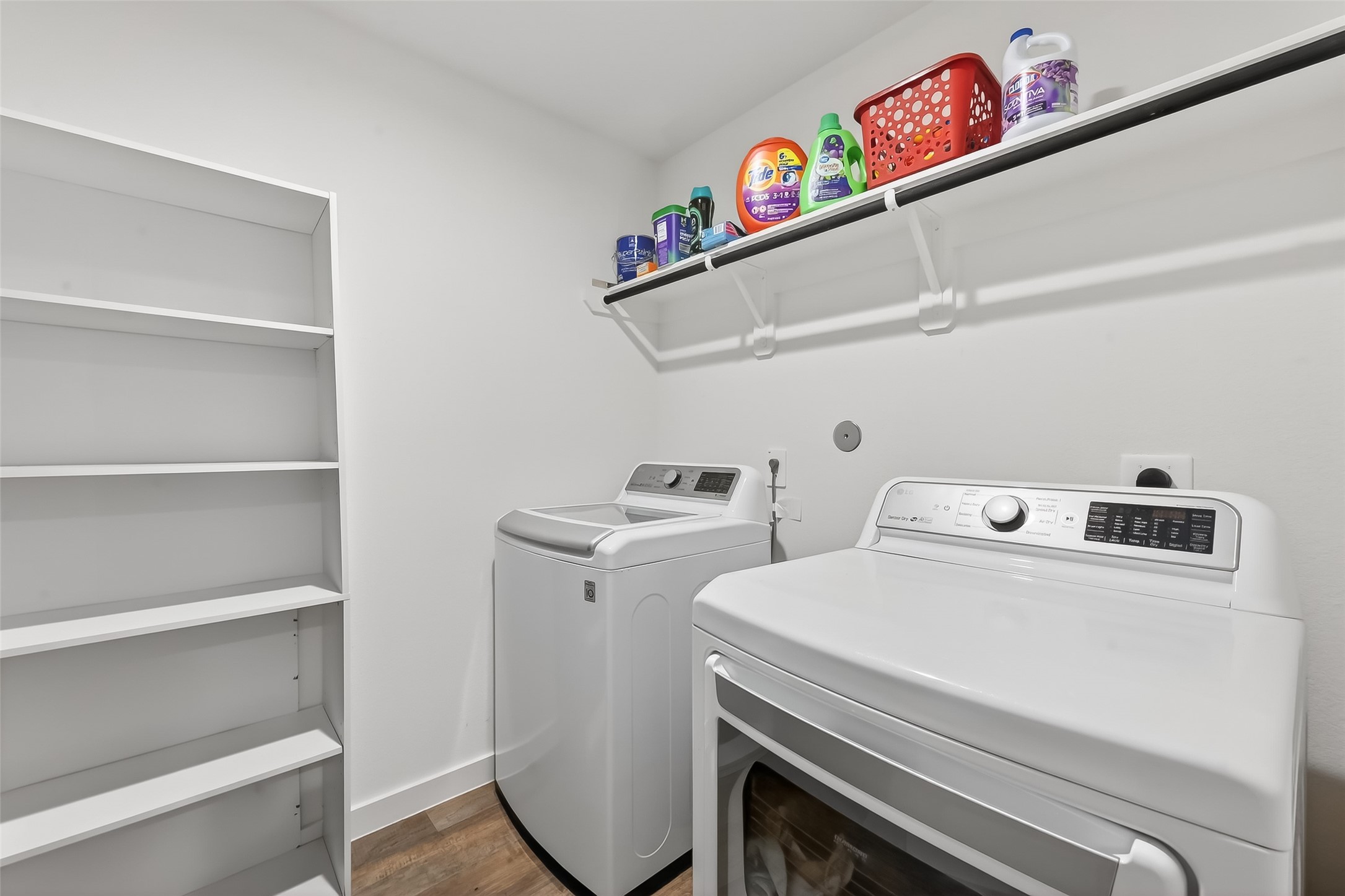 4320 Rustling Aspen Drive Rosenberg, TX 77469 - Photo 35 of 49 Spacious laundry room featuring additional shelving for enhanced storage and easy organization