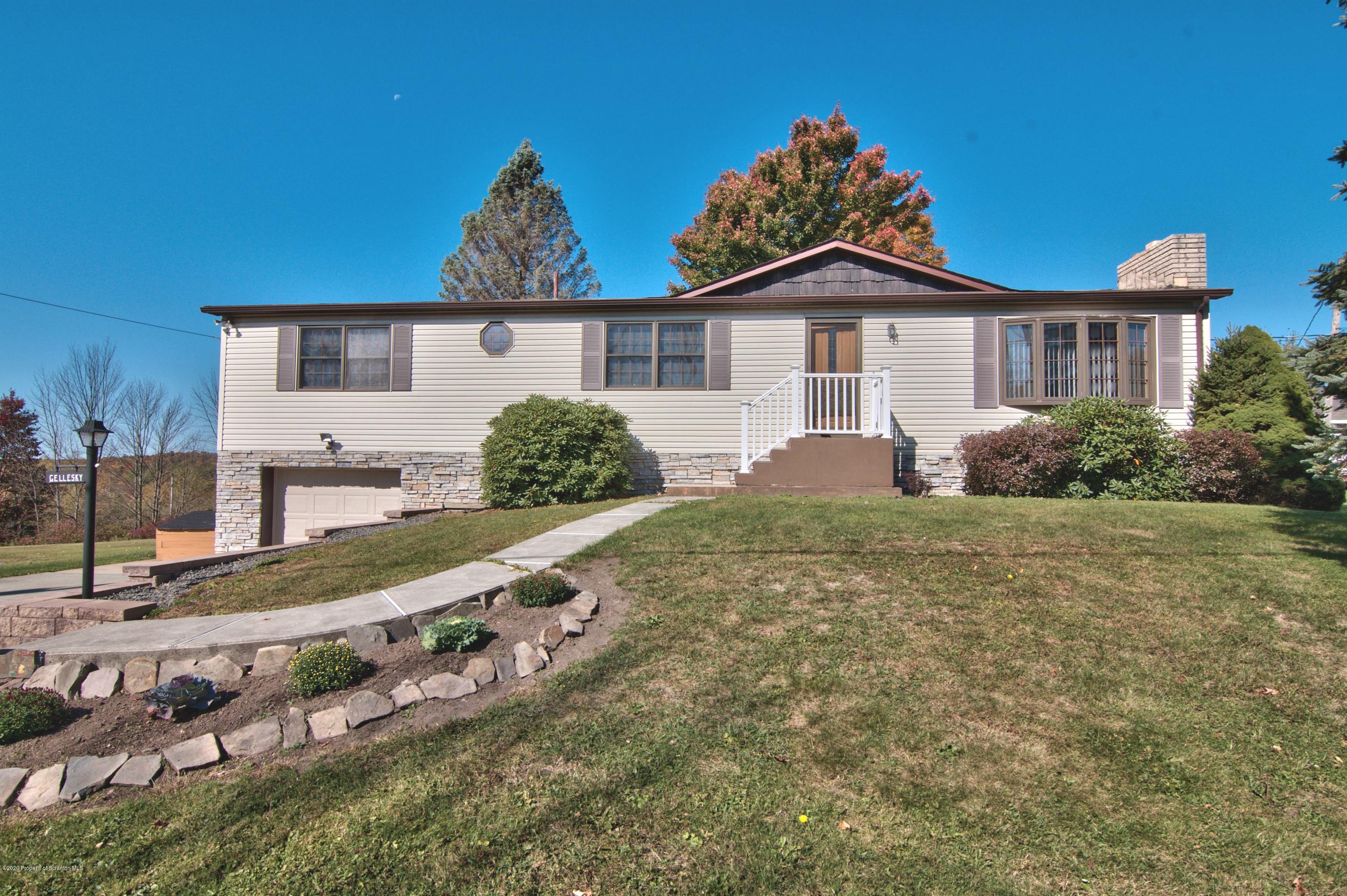 2151 Aberdeen Road Moscow, PA 18444 - Photo 1 of 65 a front view of a house with garden