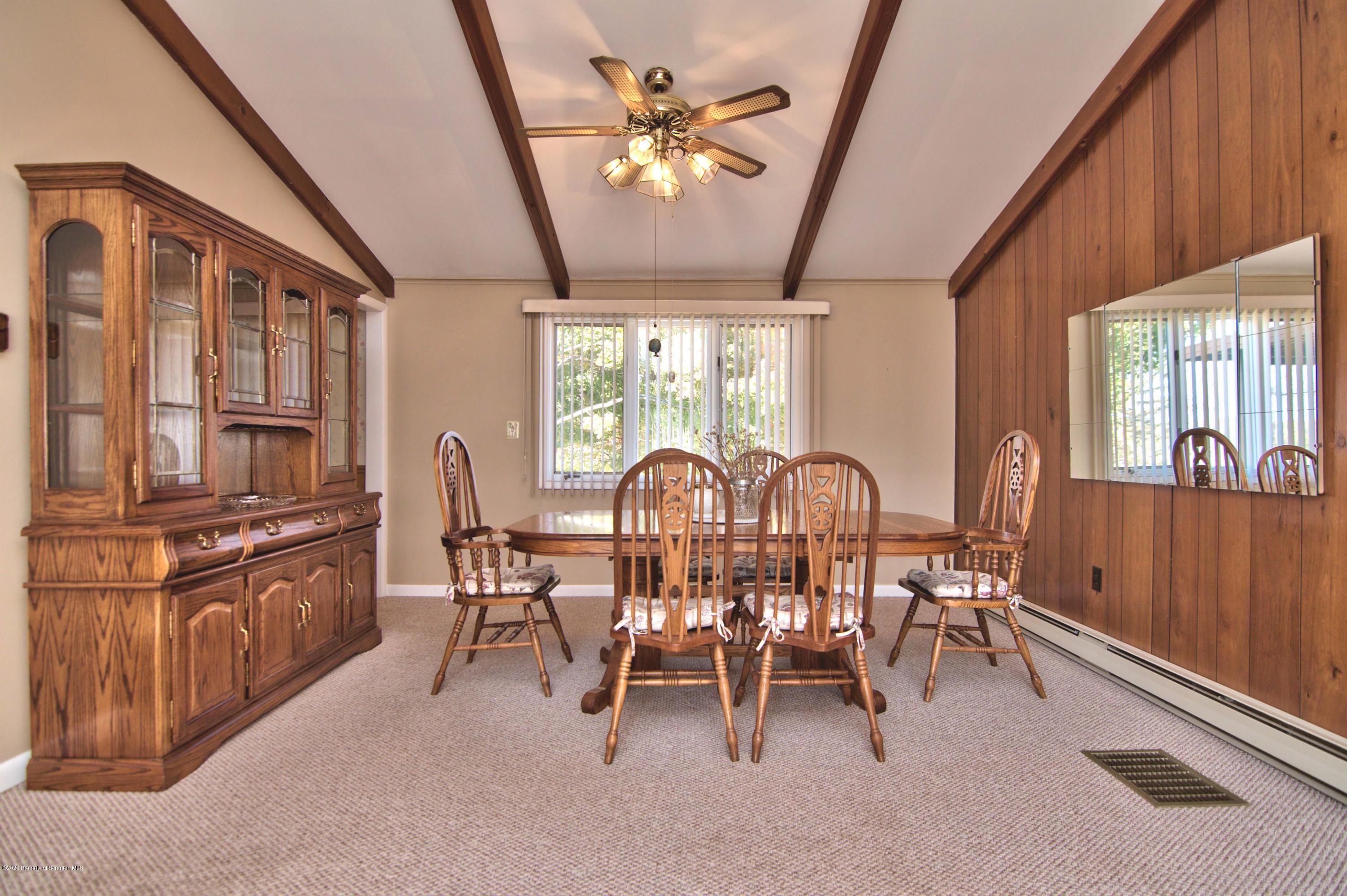 2151 Aberdeen Road Moscow, PA 18444 - Photo 12 of 65 a view of a dining room with furniture window and outside view