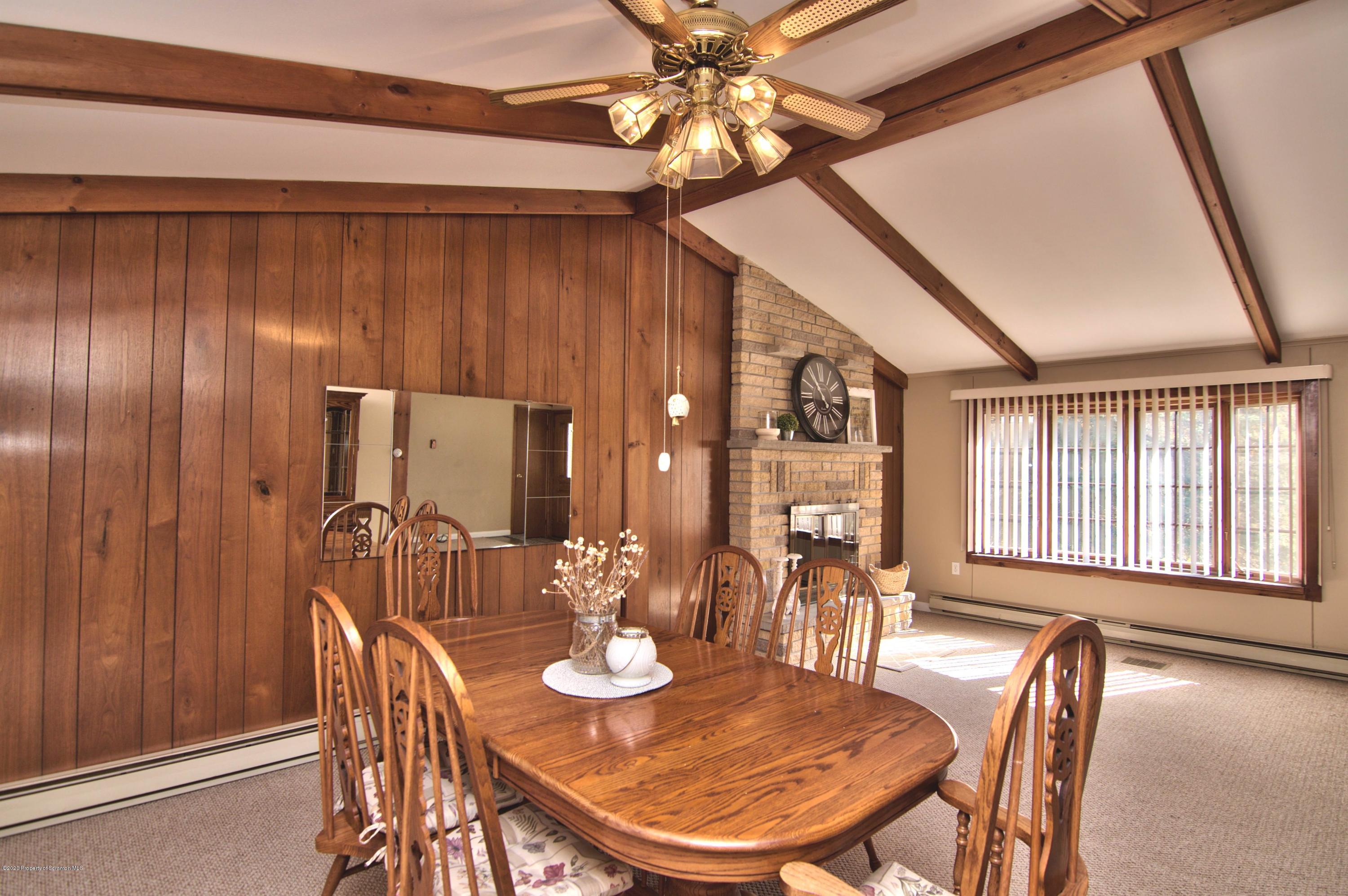 2151 Aberdeen Road Moscow, PA 18444 - Photo 16 of 65 a dining room with furniture and chandelier