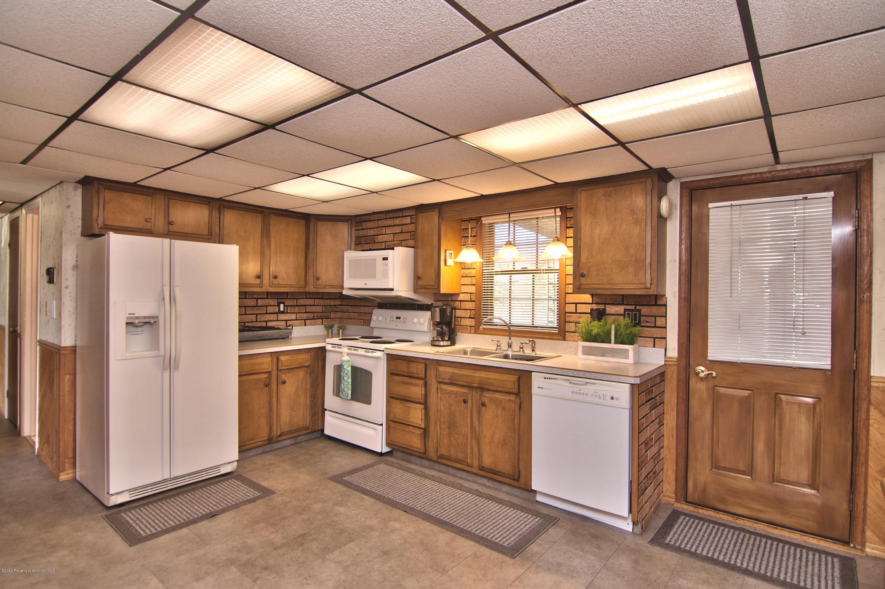 2151 Aberdeen Road Moscow, PA 18444 - Photo 17 of 65 a kitchen with refrigerator and cabinets