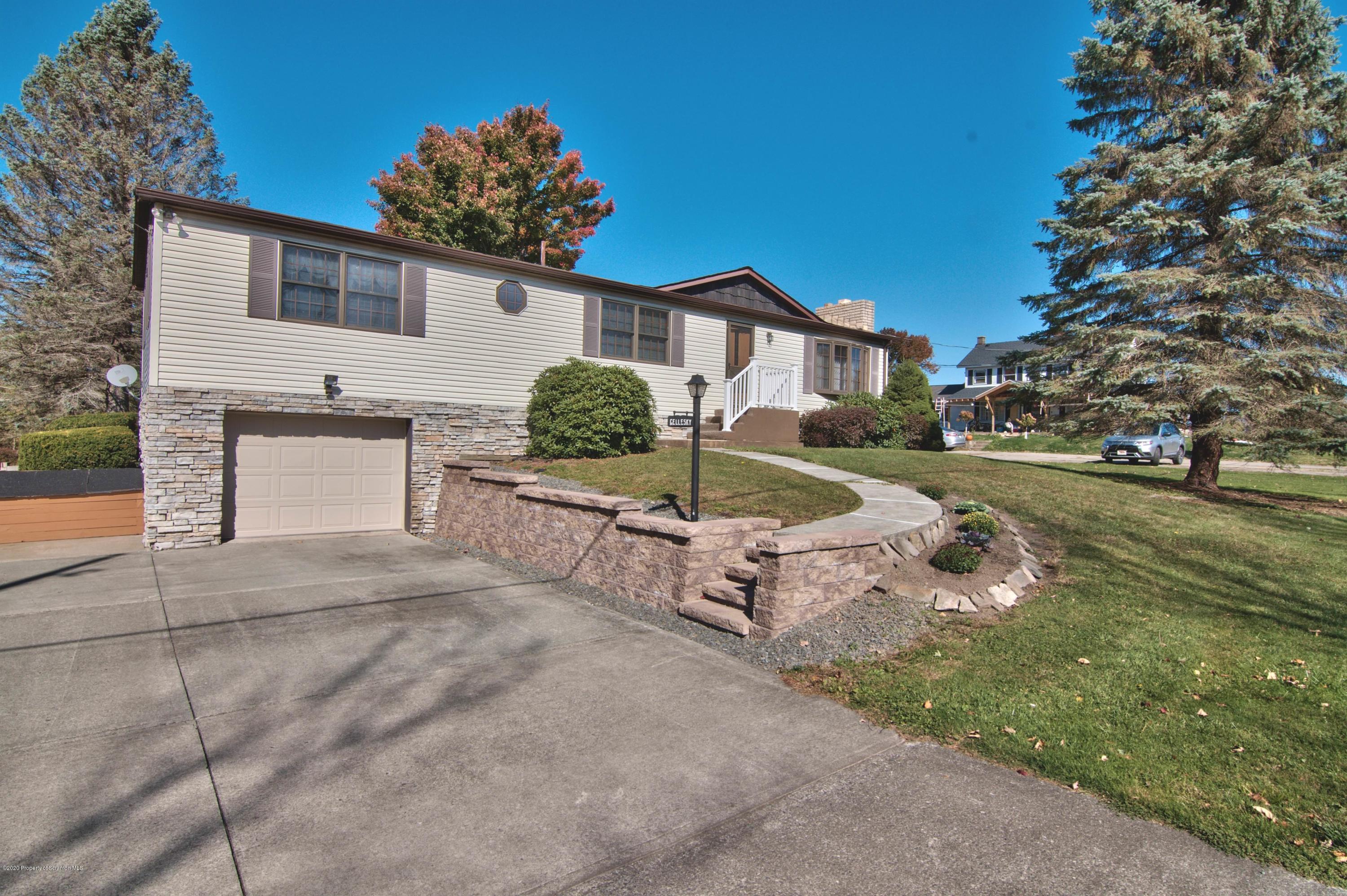 2151 Aberdeen Road Moscow, PA 18444 - Photo 2 of 65 a view of a house with a yard and a garden