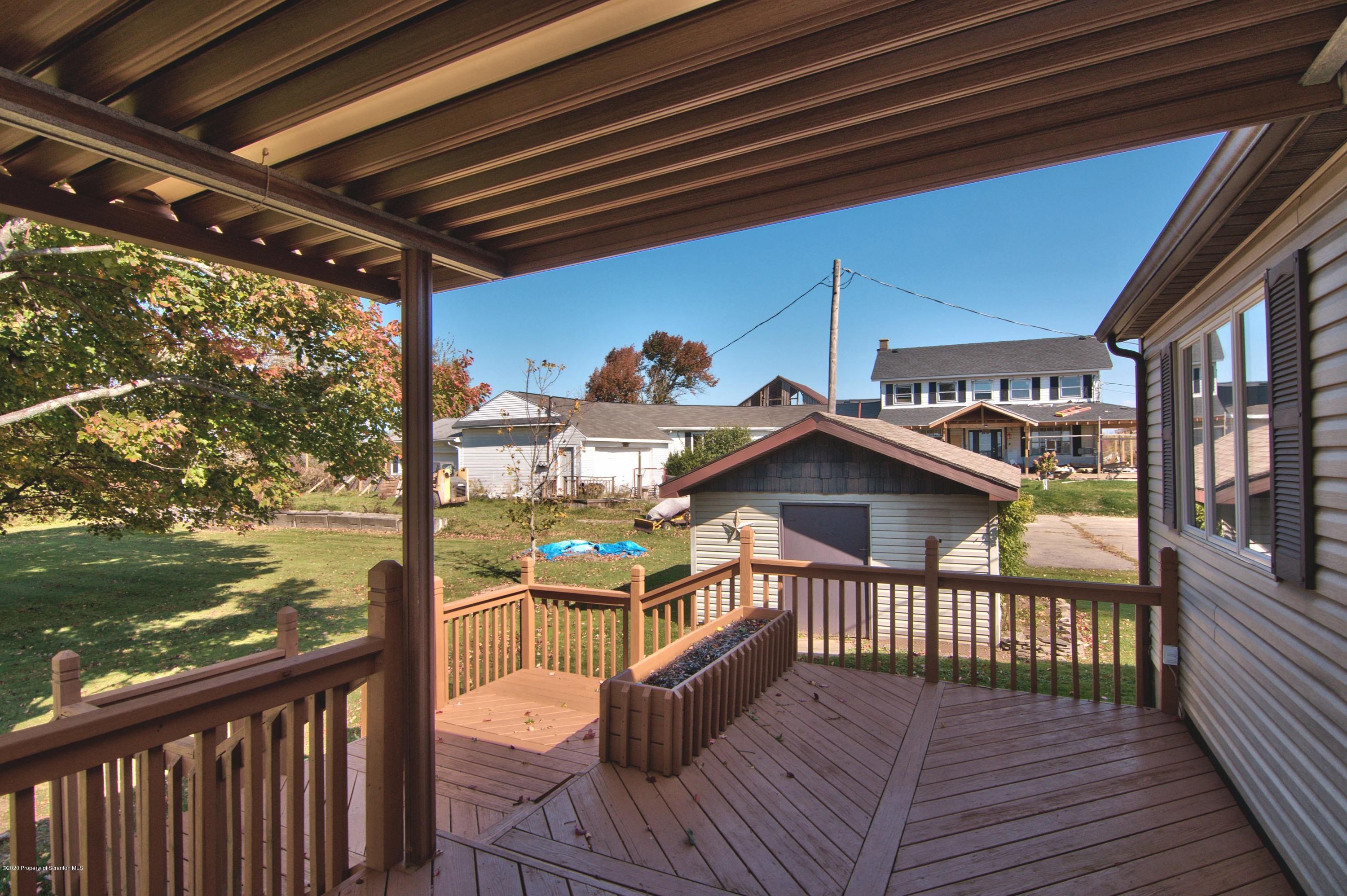 2151 Aberdeen Road Moscow, PA 18444 - Photo 48 of 65 a view of a balcony with wooden floor