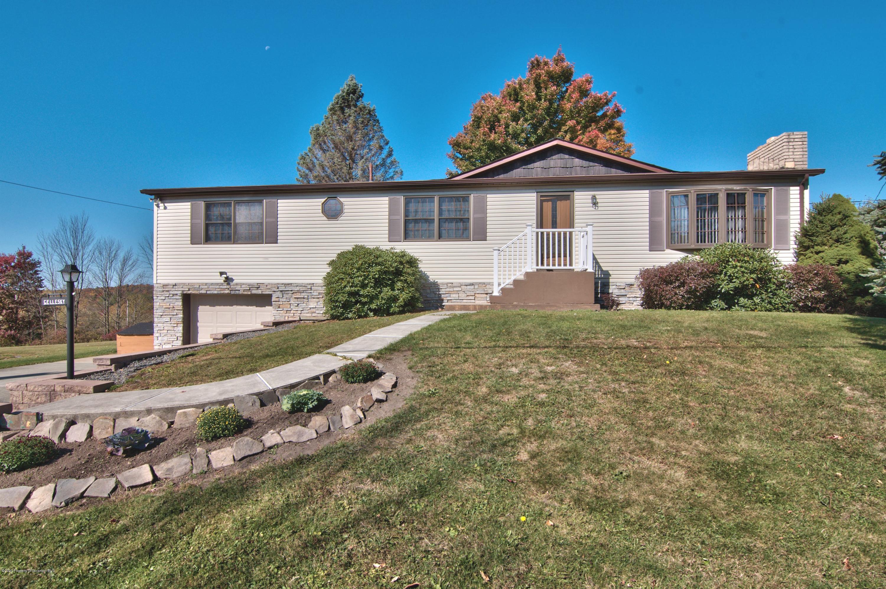 2151 Aberdeen Road Moscow, PA 18444 - Photo 61 of 65 a front view of a house with garden