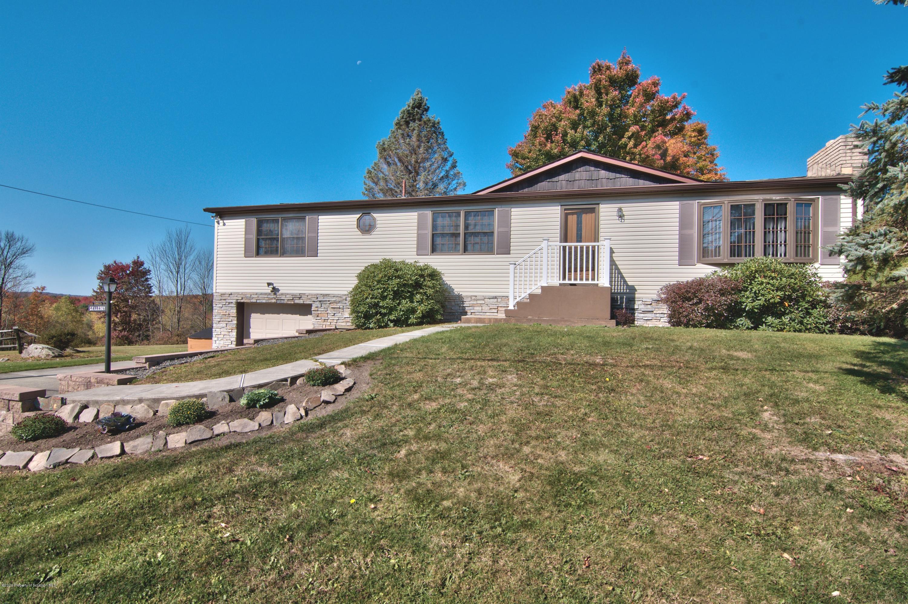 2151 Aberdeen Road Moscow, PA 18444 - Photo 62 of 65 a front view of a house with a yard