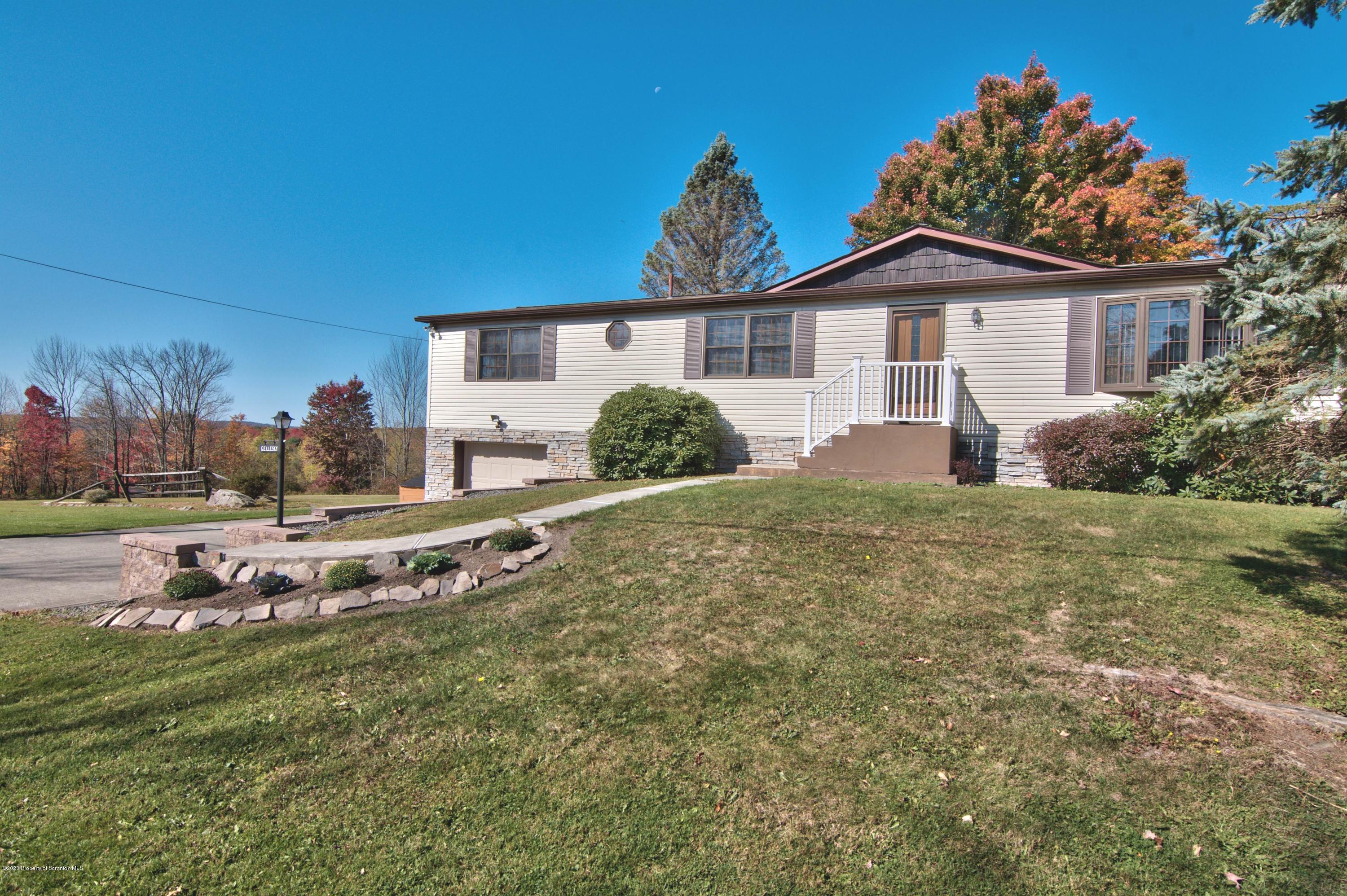 2151 Aberdeen Road Moscow, PA 18444 - Photo 63 of 65 a front view of a house with a yard