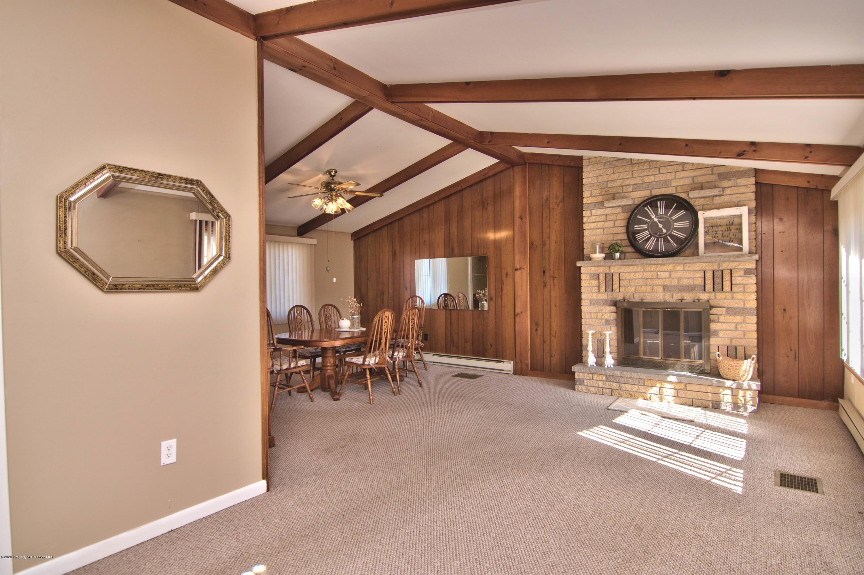 2151 Aberdeen Road Moscow, PA 18444 - Photo 7 of 65 a view of livingroom with furniture and fan