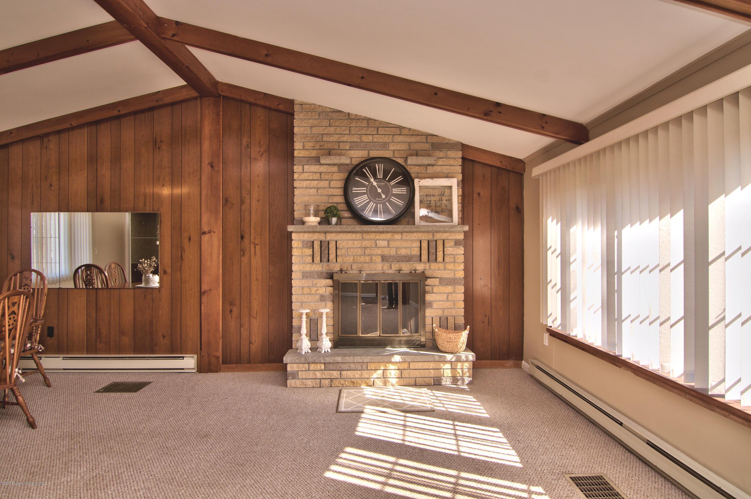 2151 Aberdeen Road Moscow, PA 18444 - Photo 9 of 65 a view of entrance with wooden floor and door