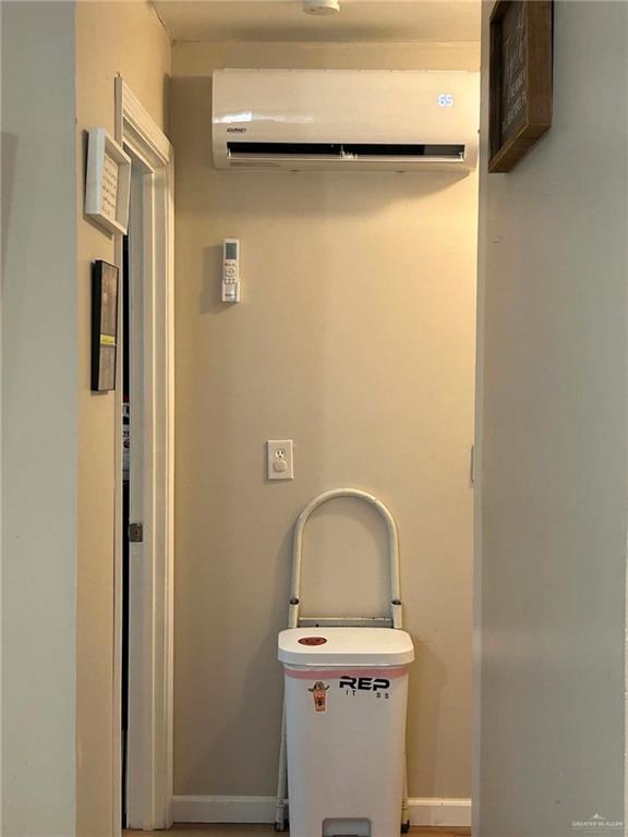 1104 Esperanza Road Alamo, TX 78516 - Photo 9 of 21 a close view of a utility room with dryer and washer