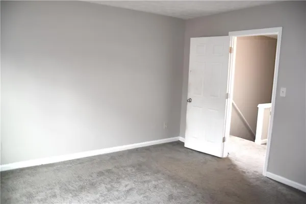 an empty room with an entryway