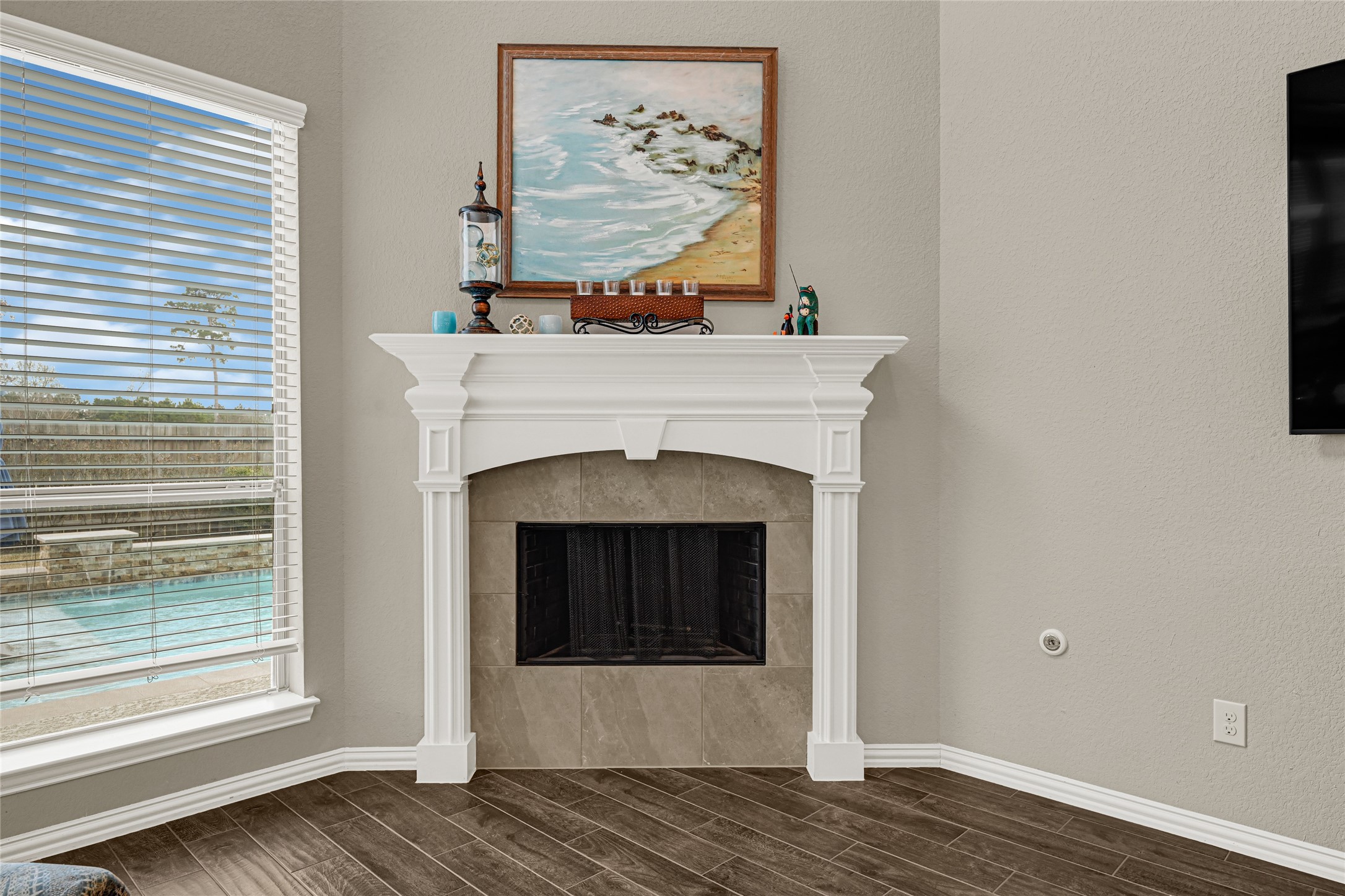 10319 Silver Shield Way Tomball, TX 77375 - Photo 17 of 46 a view of a livingroom with a fireplace and window