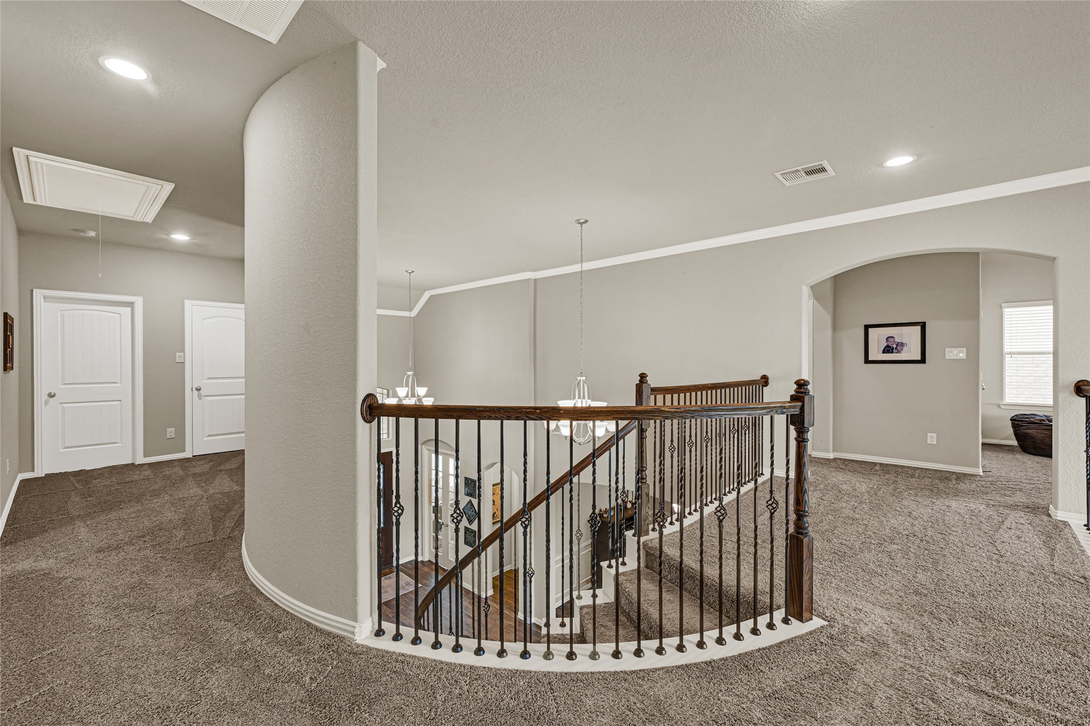 10319 Silver Shield Way Tomball, TX 77375 - Photo 23 of 46 a view of staircase with white walls and windows