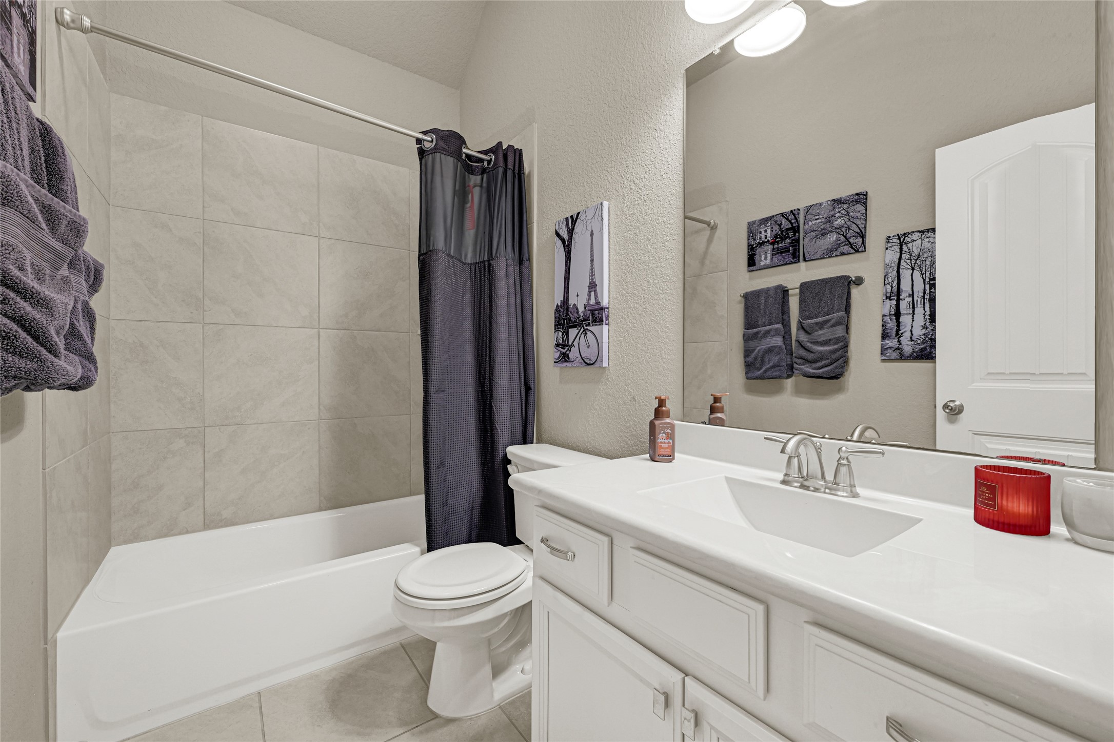 10319 Silver Shield Way Tomball, TX 77375 - Photo 26 of 46 a bathroom with a sink a toilet and shower