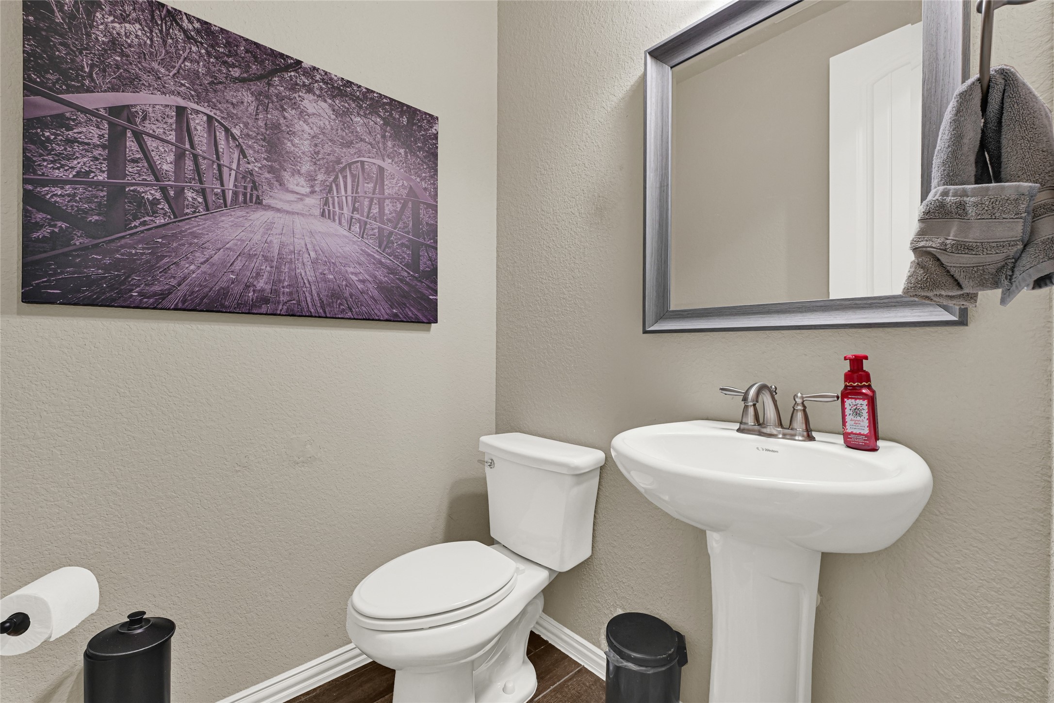 10319 Silver Shield Way Tomball, TX 77375 - Photo 36 of 46 a bathroom with a toilet sink and mirror