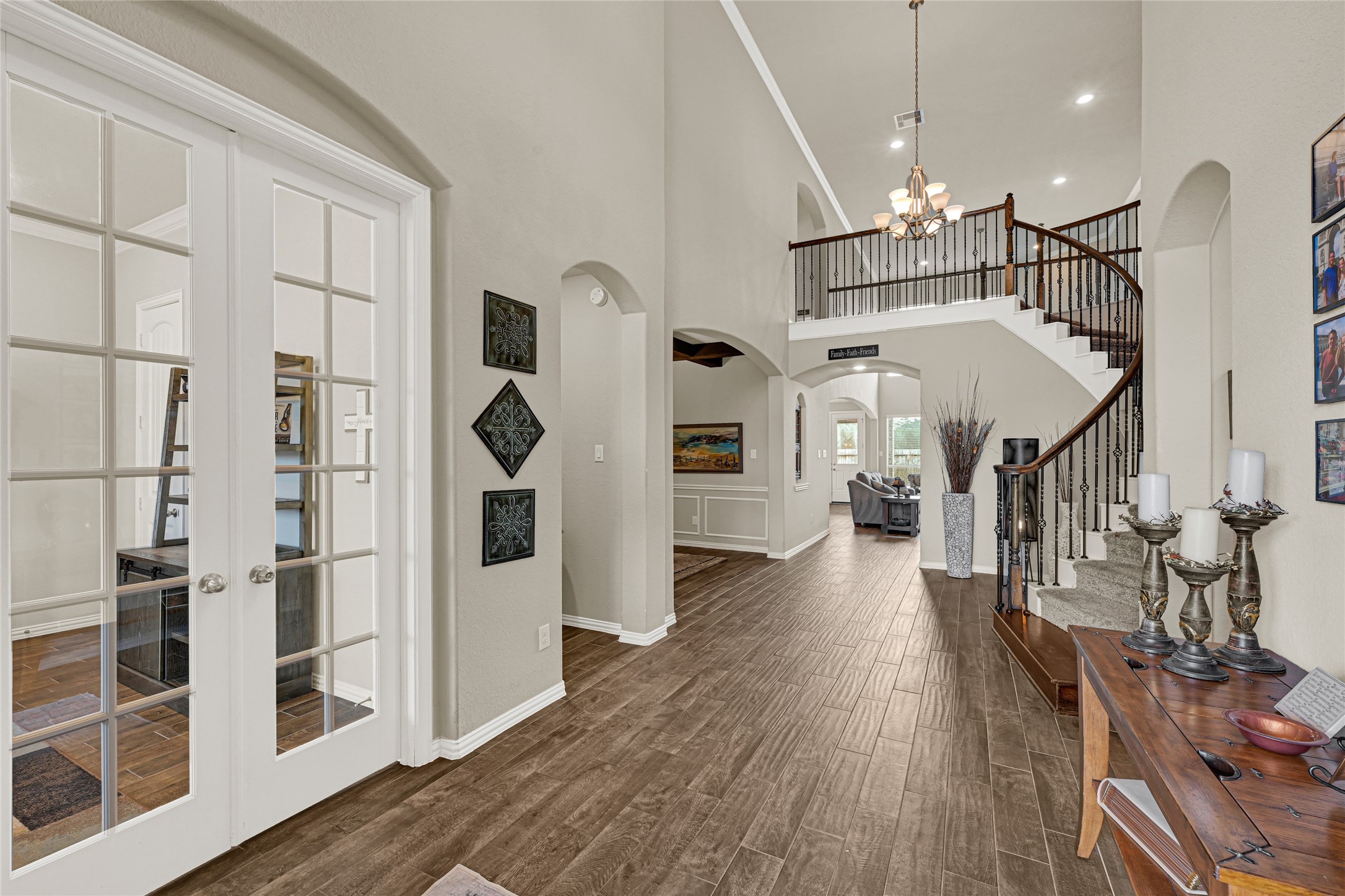 10319 Silver Shield Way Tomball, TX 77375 - Photo 4 of 46 a view of a living room with furniture and wooden floor
