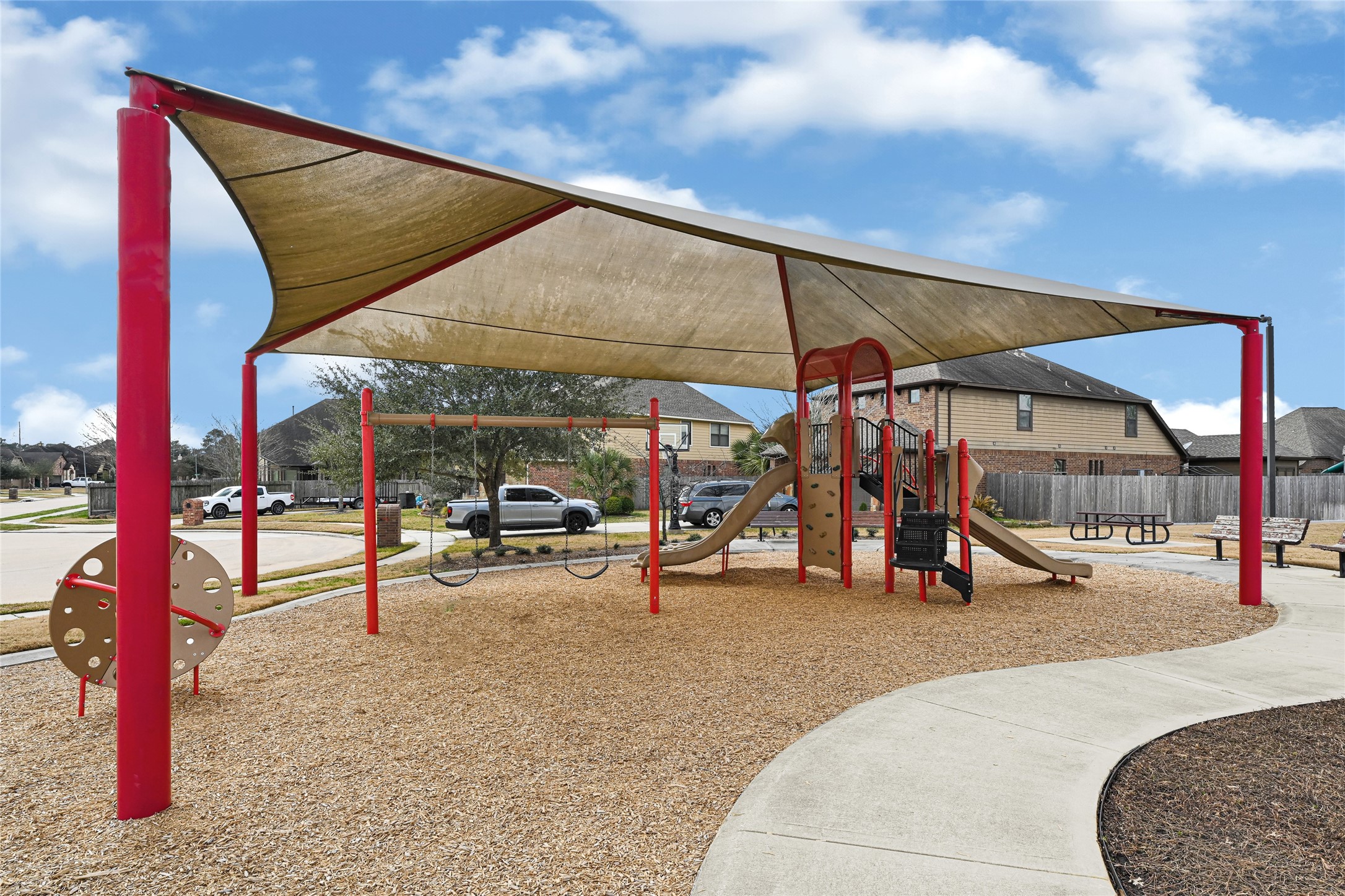 10319 Silver Shield Way Tomball, TX 77375 - Photo 44 of 46 a view of a park with swings