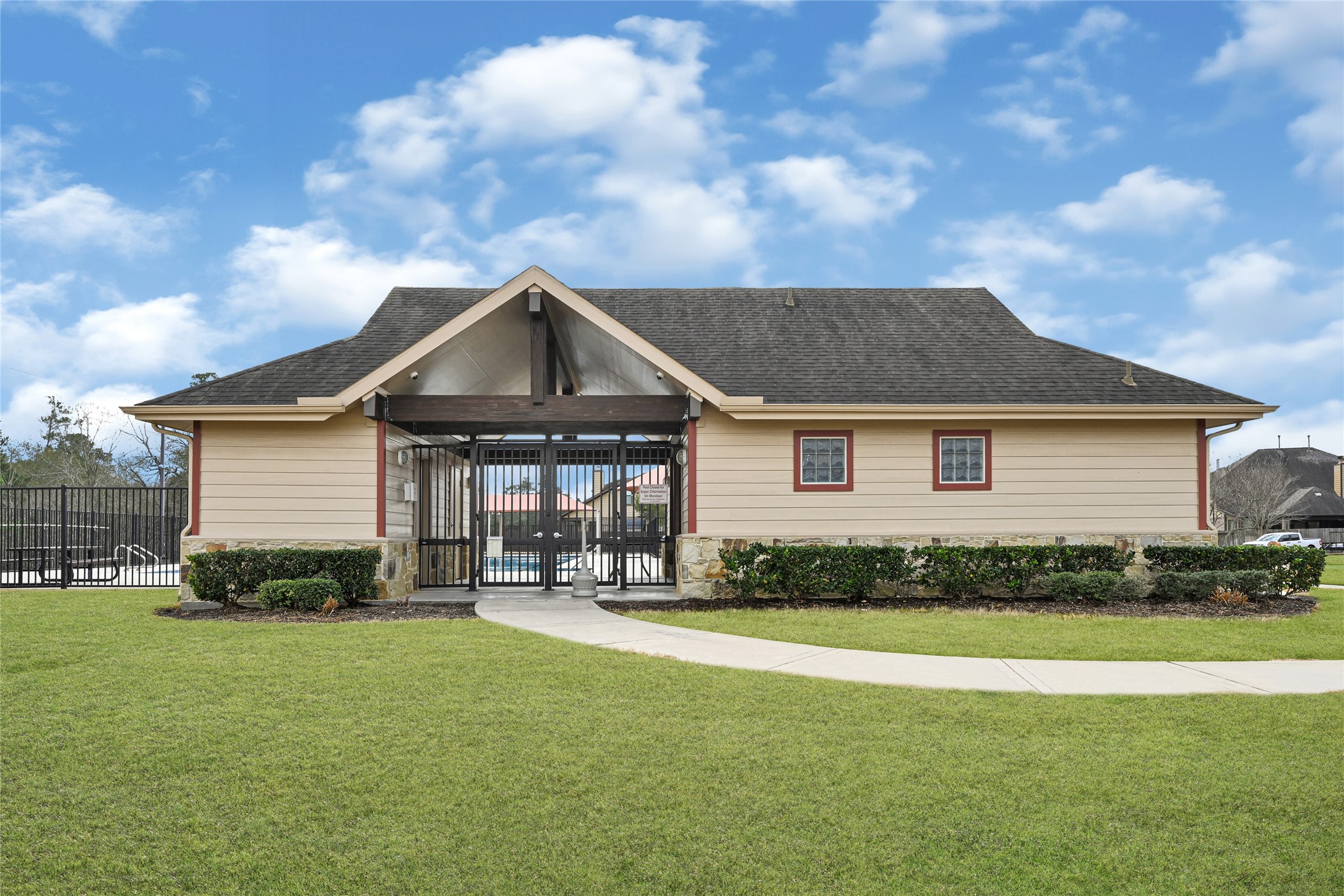 10319 Silver Shield Way Tomball, TX 77375 - Photo 45 of 46 a front view of a house with a yard