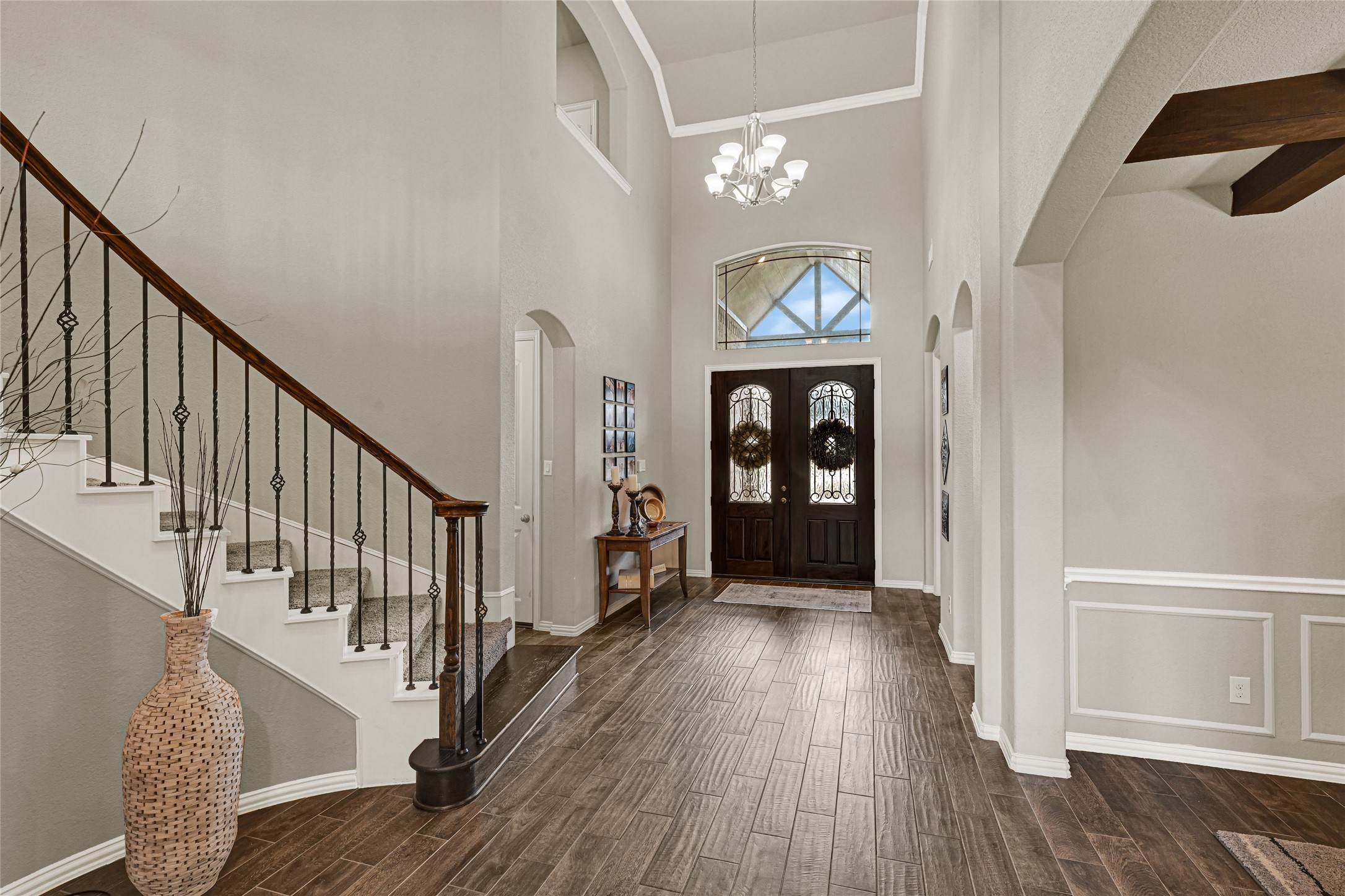 10319 Silver Shield Way Tomball, TX 77375 - Photo 5 of 46 a view of an entryway with wooden floor