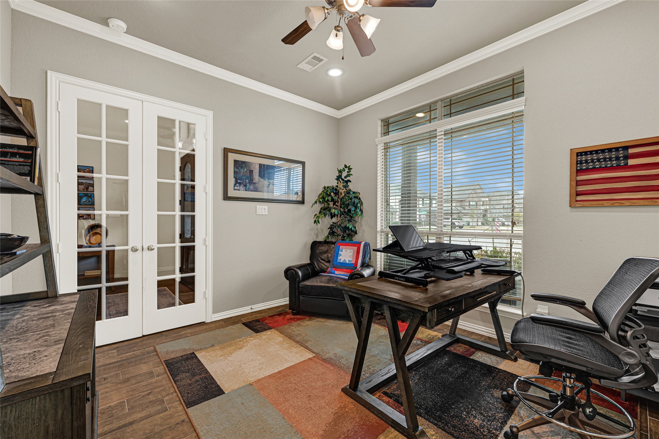 10319 Silver Shield Way Tomball, TX 77375 - Photo 7 of 46 a view of a workspace with furniture