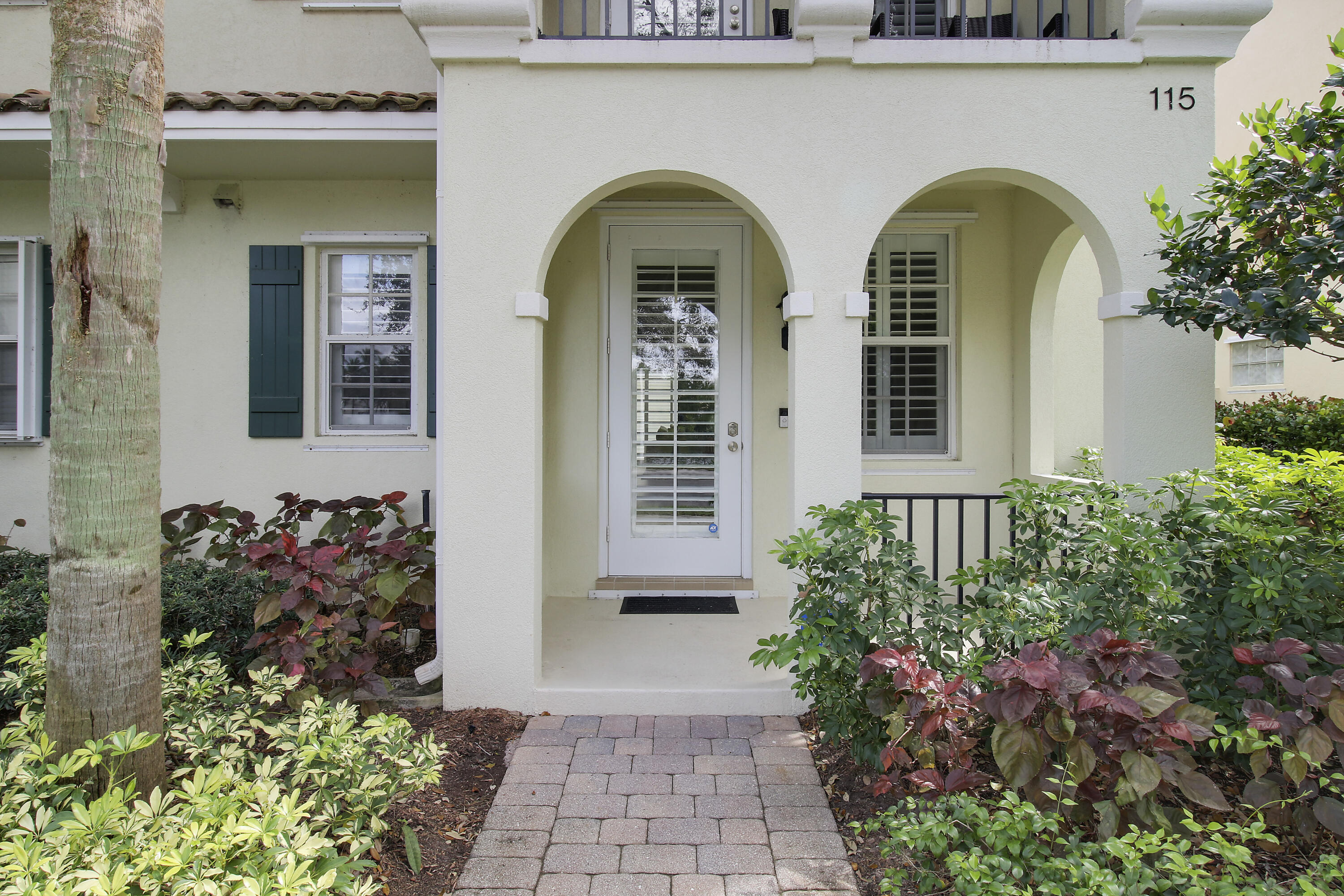 115 Rivinia Drive Jupiter, FL 33458 - Photo 34 of 42 Charming front door/walkway